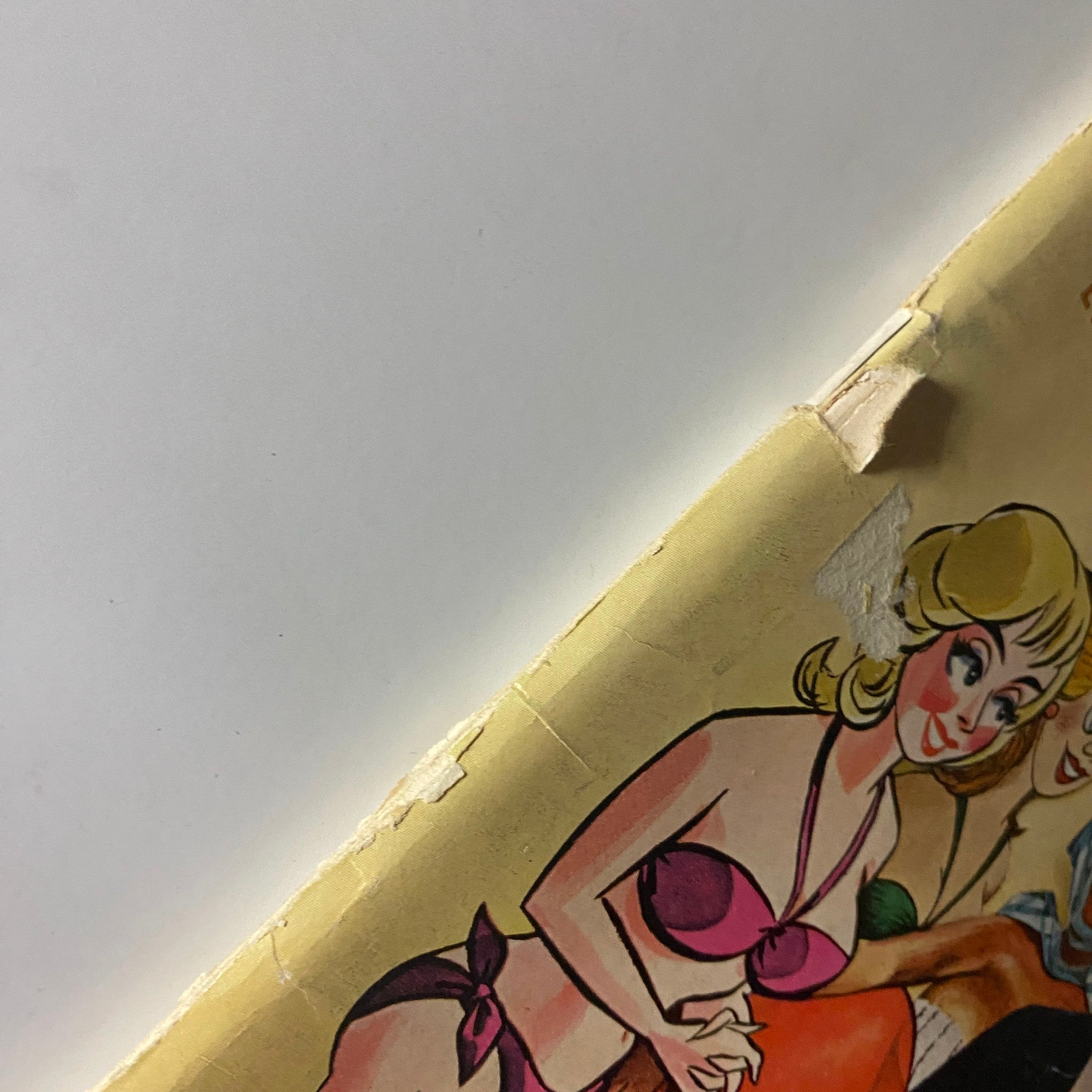 Close-up of the top portion of the Playboy Magazine August 1961 cover, showcasing models in swimsuits.