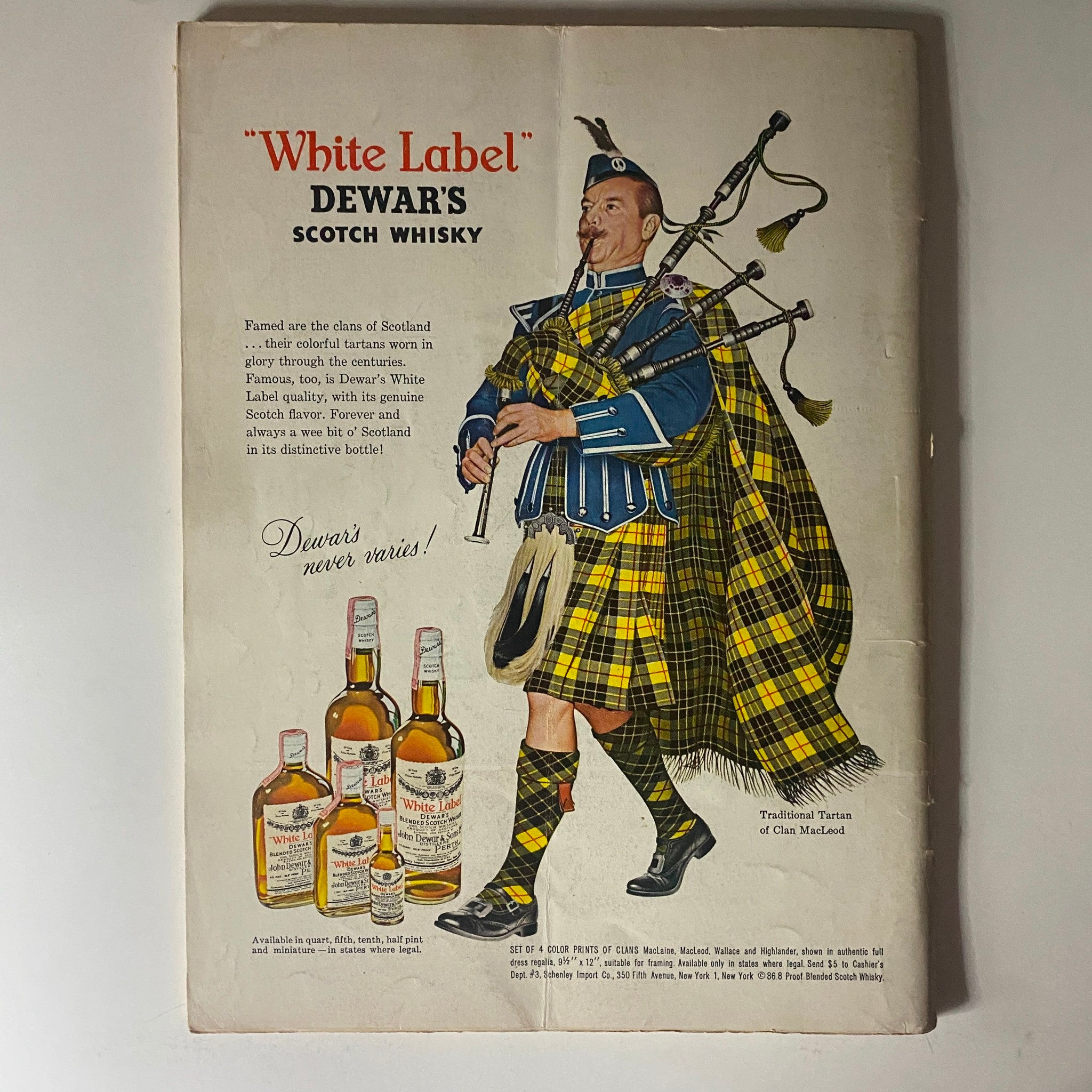 Back cover of Playboy Magazine August 1961 featuring an advertisement for Dewar's White Label Scotch Whisky.