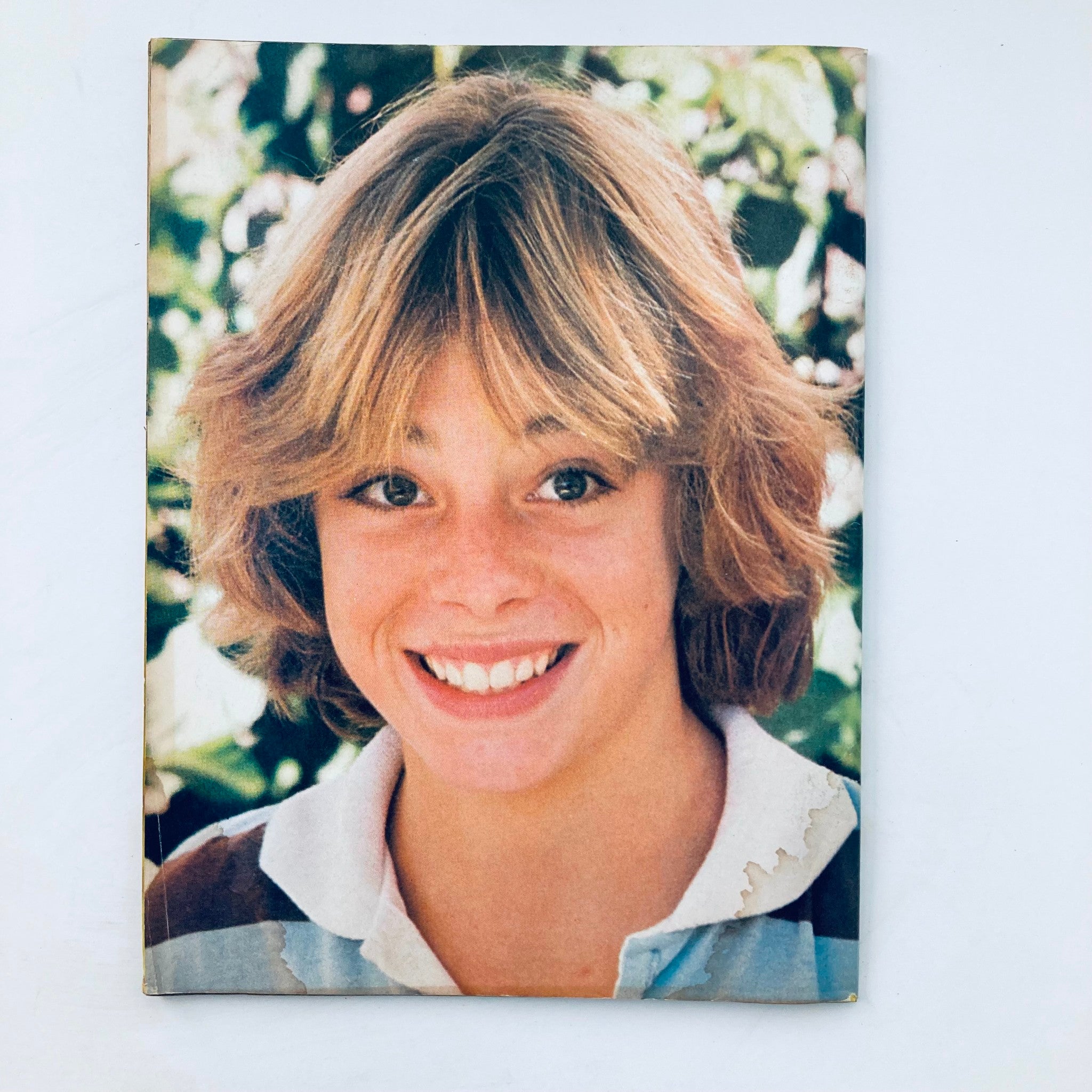 A portrait of a smiling young boy with tousled hair, displaying a cheerful expression. The image is reminiscent of the 1977 Tiger Beat Super Special #3, presenting an iconic look from the era.