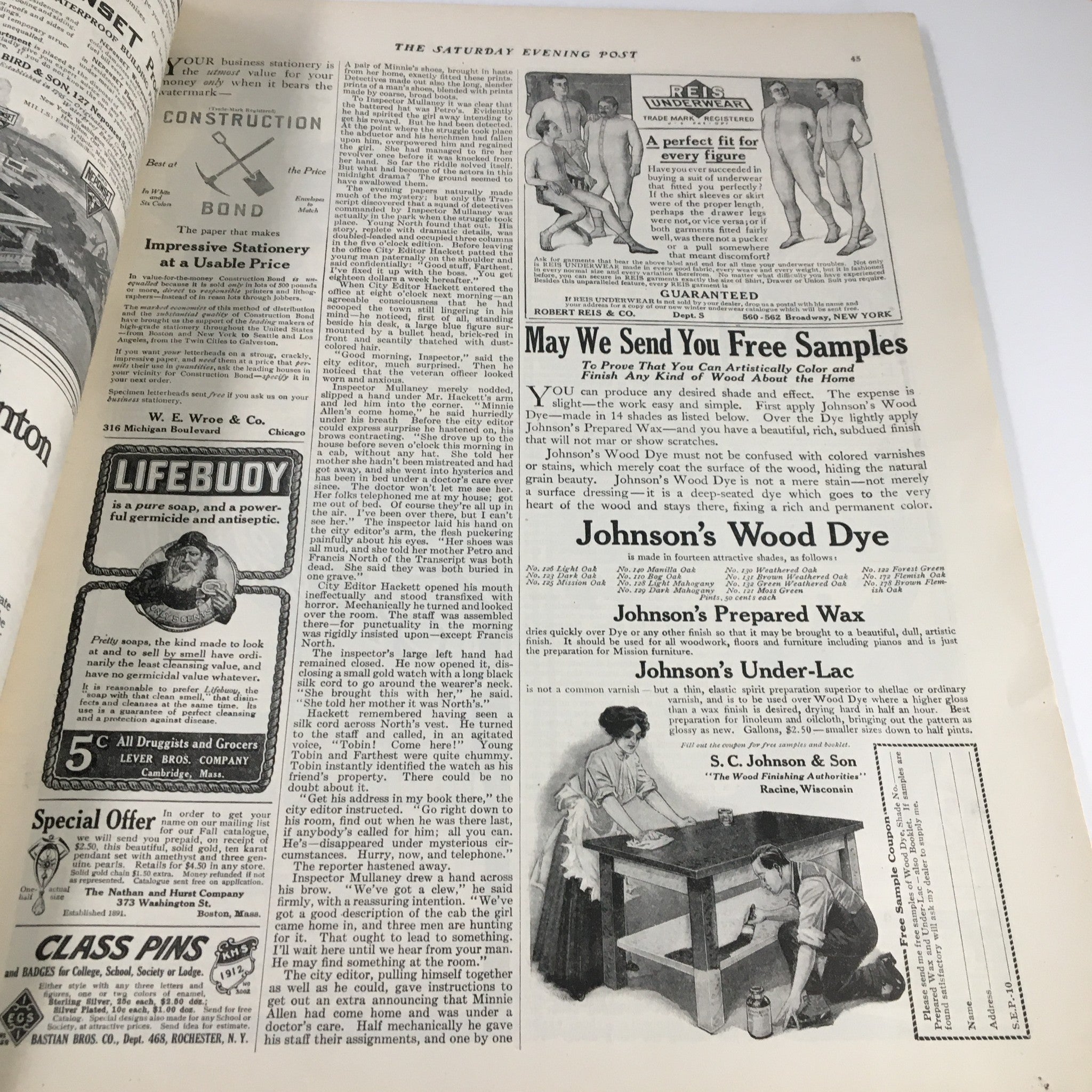 The Saturday Evening Post October 22 1910 showcasing advertisements on a magazine page, including products like Johnson's Wood Dye and a household solution, indicative of early 20th-century marketing.