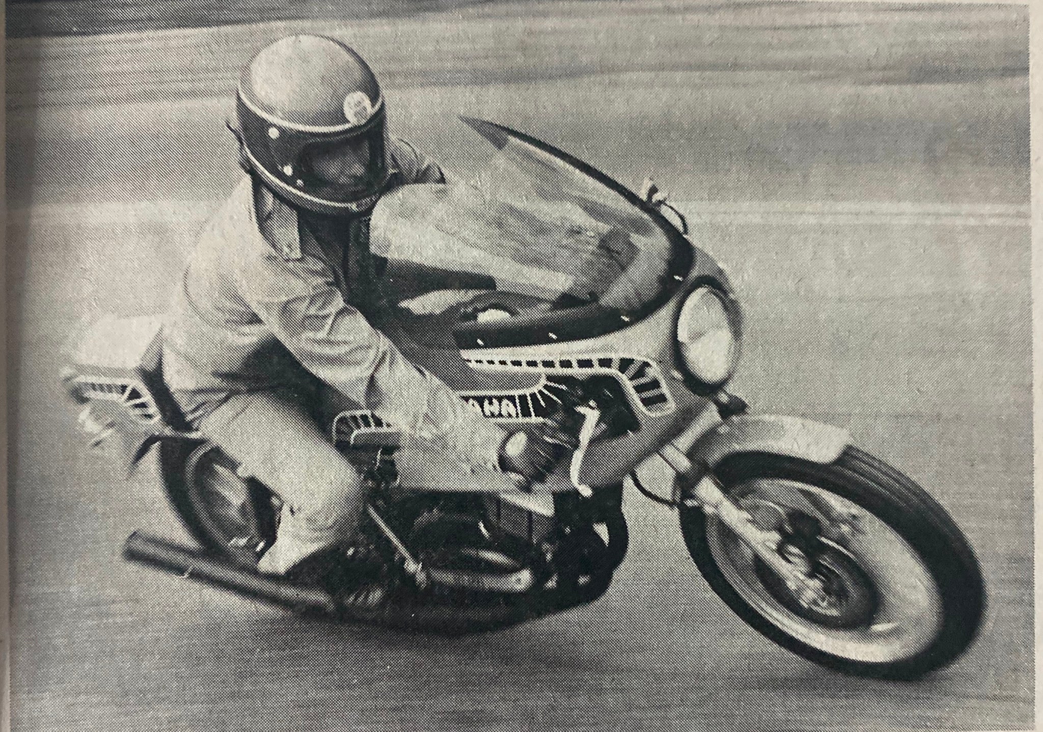 Action shot from Motorcyclist Magazine February 1975 featuring a rider on a Honda MT250 motorcycle, illustrating the excitement of classic motorcycling.