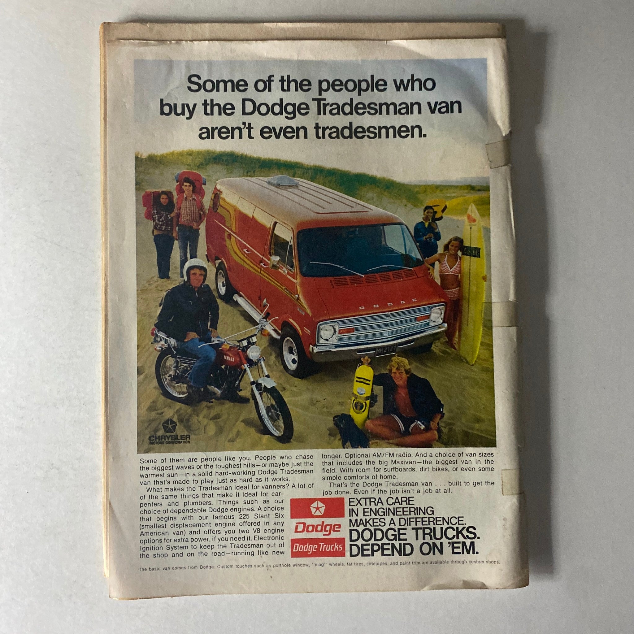 Vintage advertisement from Motorcyclist Magazine February 1975 showcasing the Dodge Tradesman van, emphasizing its appeal beyond tradesmen.