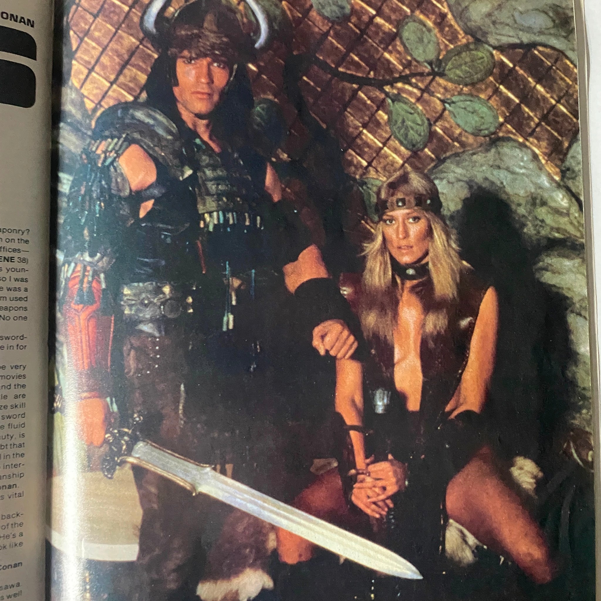 Prevue Magazine July 1982 features a vibrant image of two characters dressed in fantasy warrior attire, showcasing the film genre style of the 1980s. This cover highlights iconic films and personalities, including those from action and sci-fi genres.