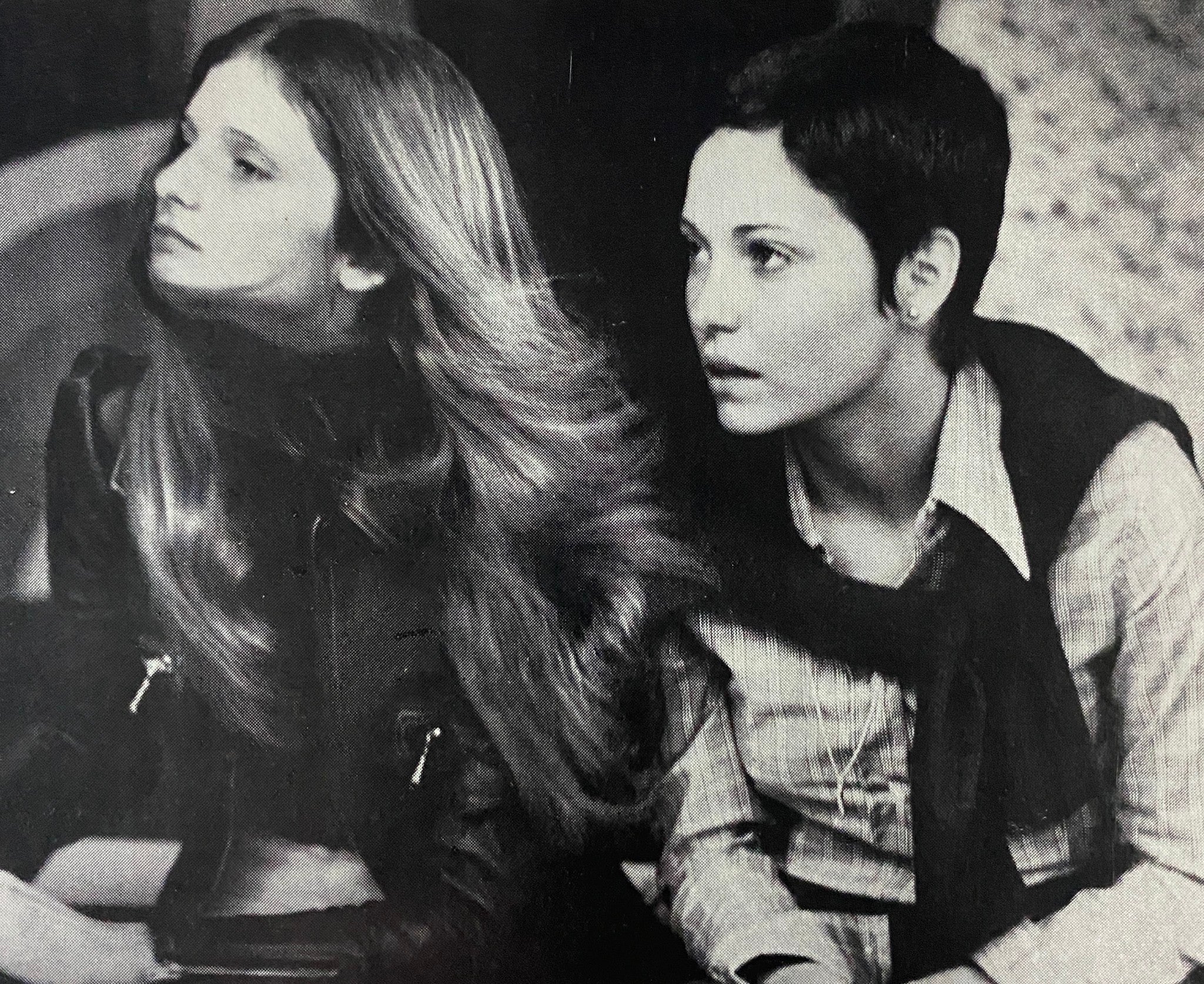 Black and white photograph of two young women in 1970s attire, featured in Viva Magazine November 1973, reflecting the era's style and cultural exchanges.