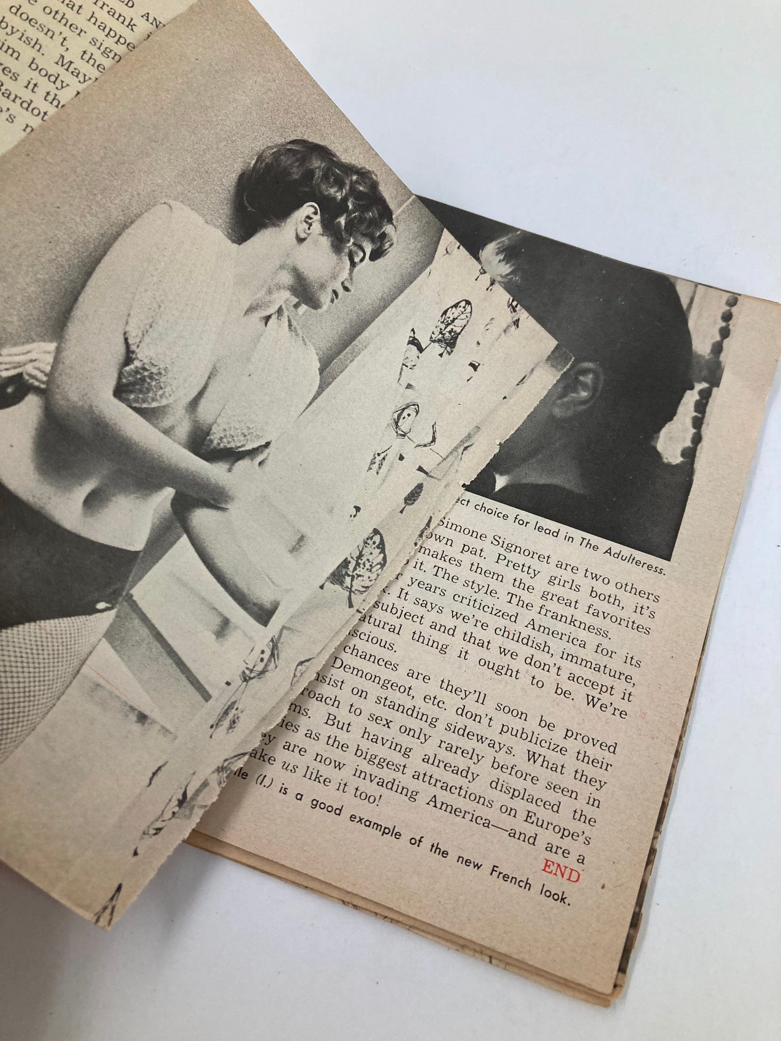 Interior page of VTG Bold Magazine April 1958, displaying black and white photography of a woman with short hair and a crochet top, illustrating the magazine's vintage allure.