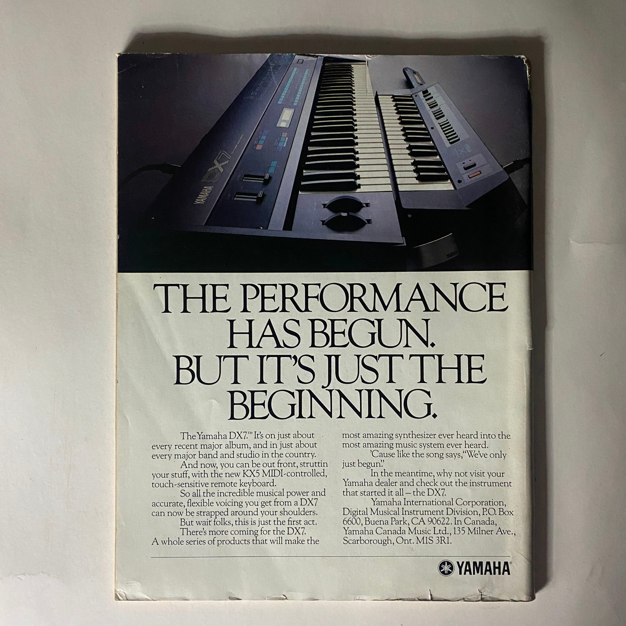 Back cover of VTG Musician Magazine December 1986 featuring a Yamaha DX7 keyboard advertisement, emphasizing musical innovation and the magazine's era.