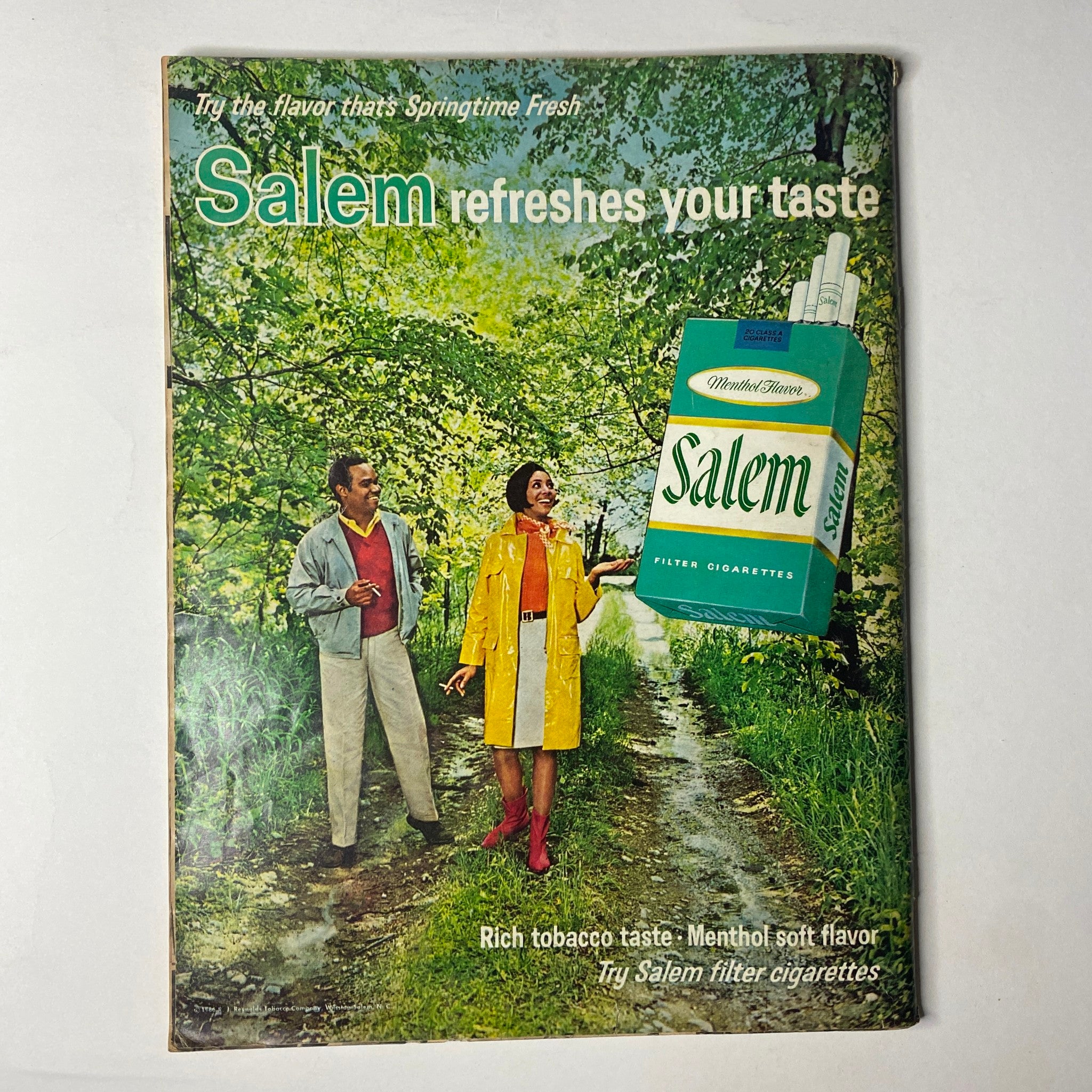 Cover image of a 1960s Salem cigarette advertisement featuring a couple, reflecting the era's fashion, included in the context of the Ebony Magazine August 1967.