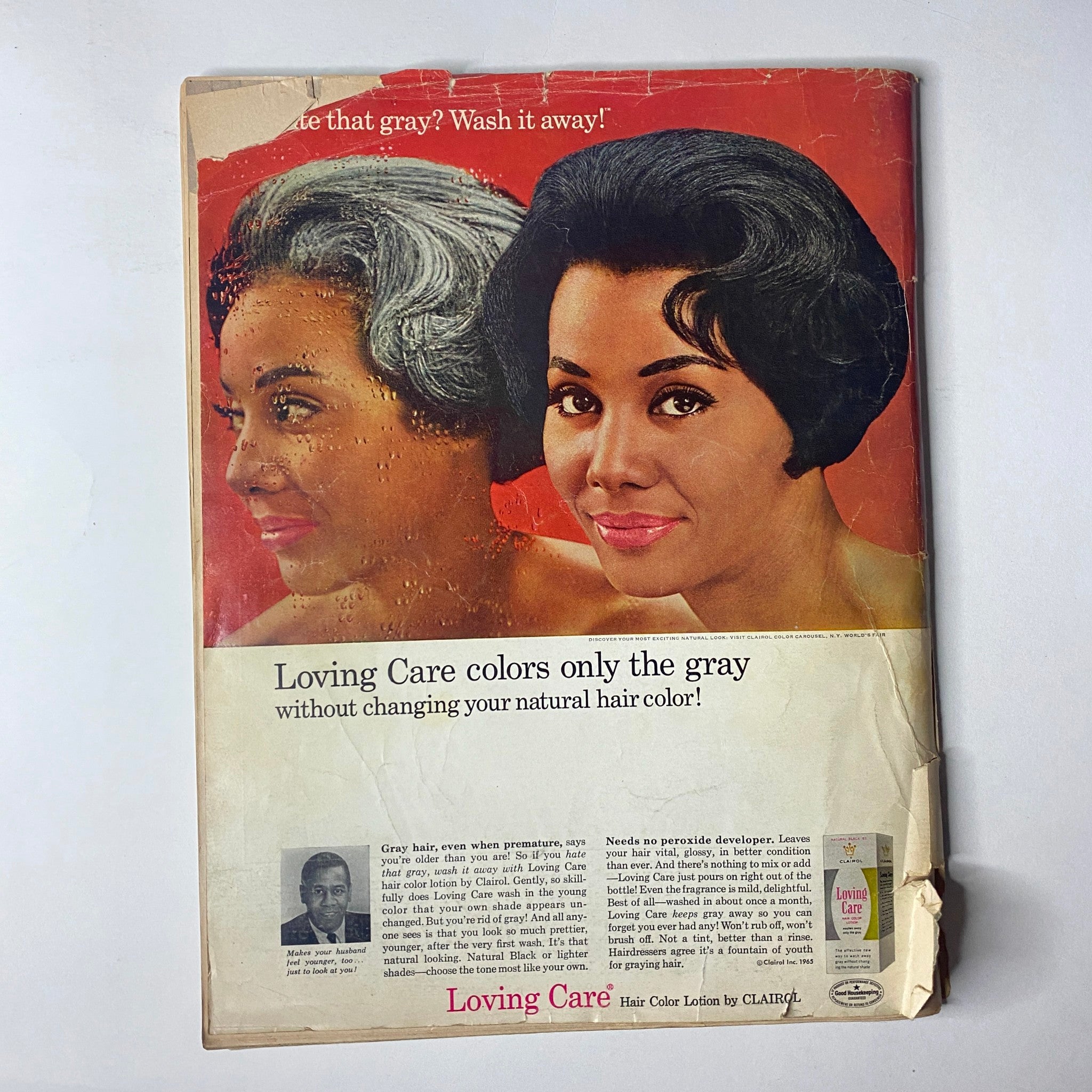 Front cover of Ebony Magazine May 1965 featuring Clairol Loving Care hair color advertisement with a model displaying the effects of gray coverage without altering natural hair color.