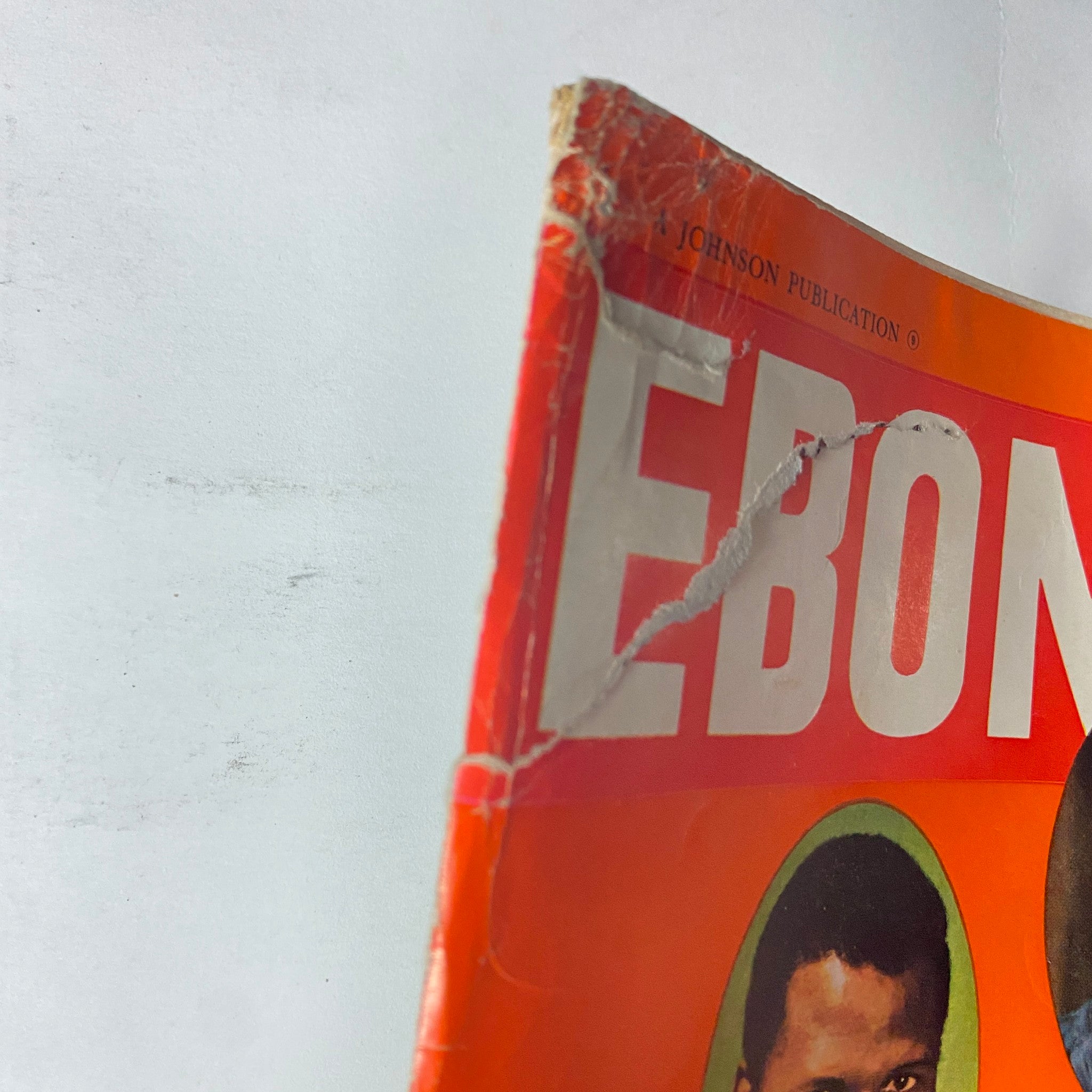Detail view of the cover of Ebony Magazine December 1967 showing wear and tear, emphasizing the magazine's vintage characteristics and historical significance.