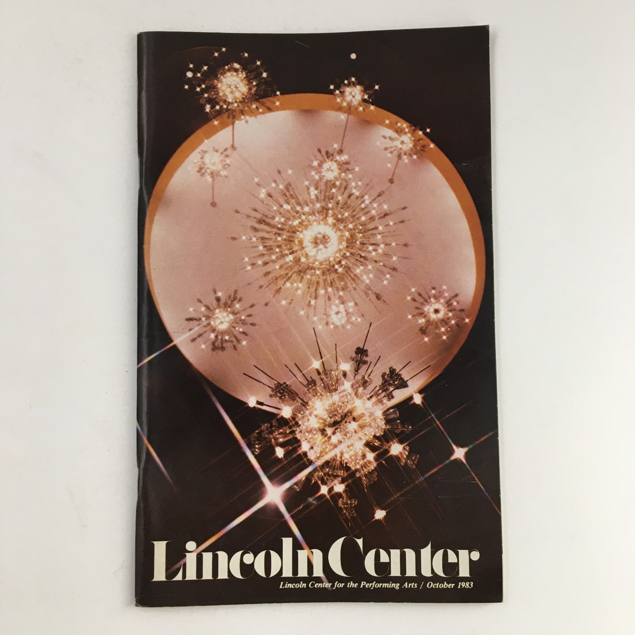 Cover of the 1983 Stagebill for Lincoln Center presenting 'A Metropolitan Century,' featuring an artistic design with sparkling lights and the title prominently displayed.