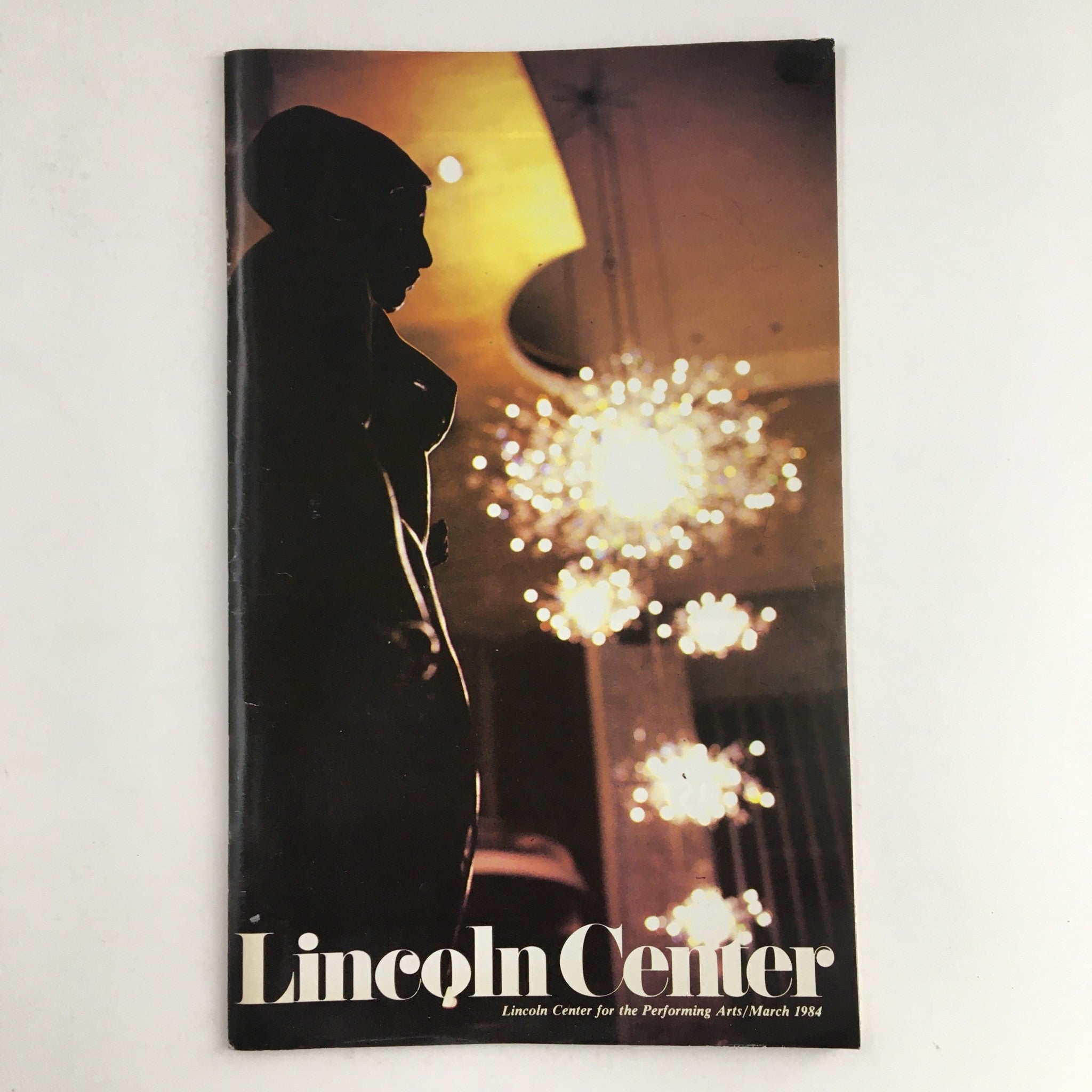 Cover of 1984 Stagebill featuring Lincoln Center, showcasing a statue silhouette and elegant lighting, highlighting the cultural event for Francesca Da Rimini and Czech Music.