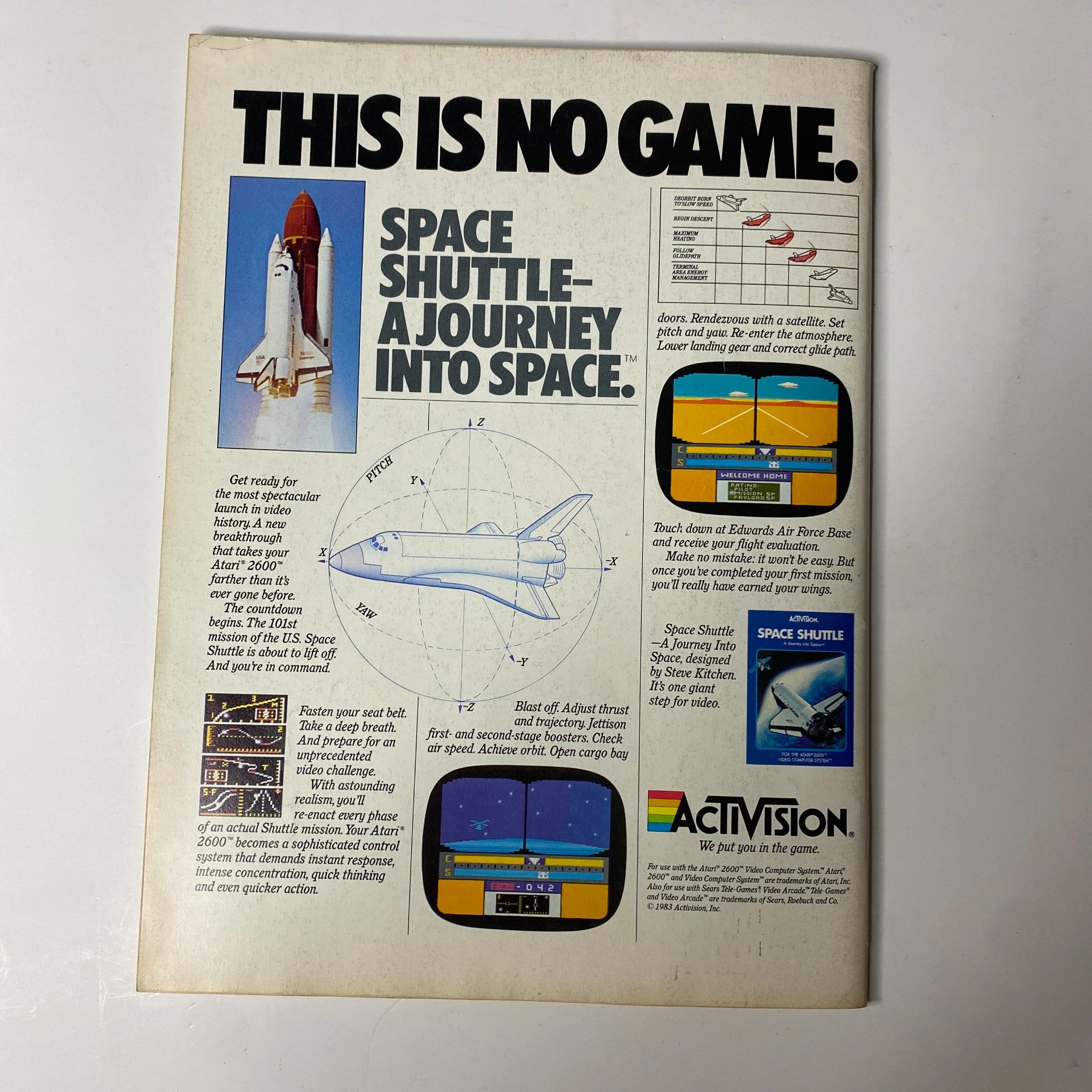 Back cover of Electronic Games Magazine December 1983 titled 'This Is No Game' featuring a promotional advertisement for the Space Shuttle video game, illustrating a space shuttle and highlighting features of the game.