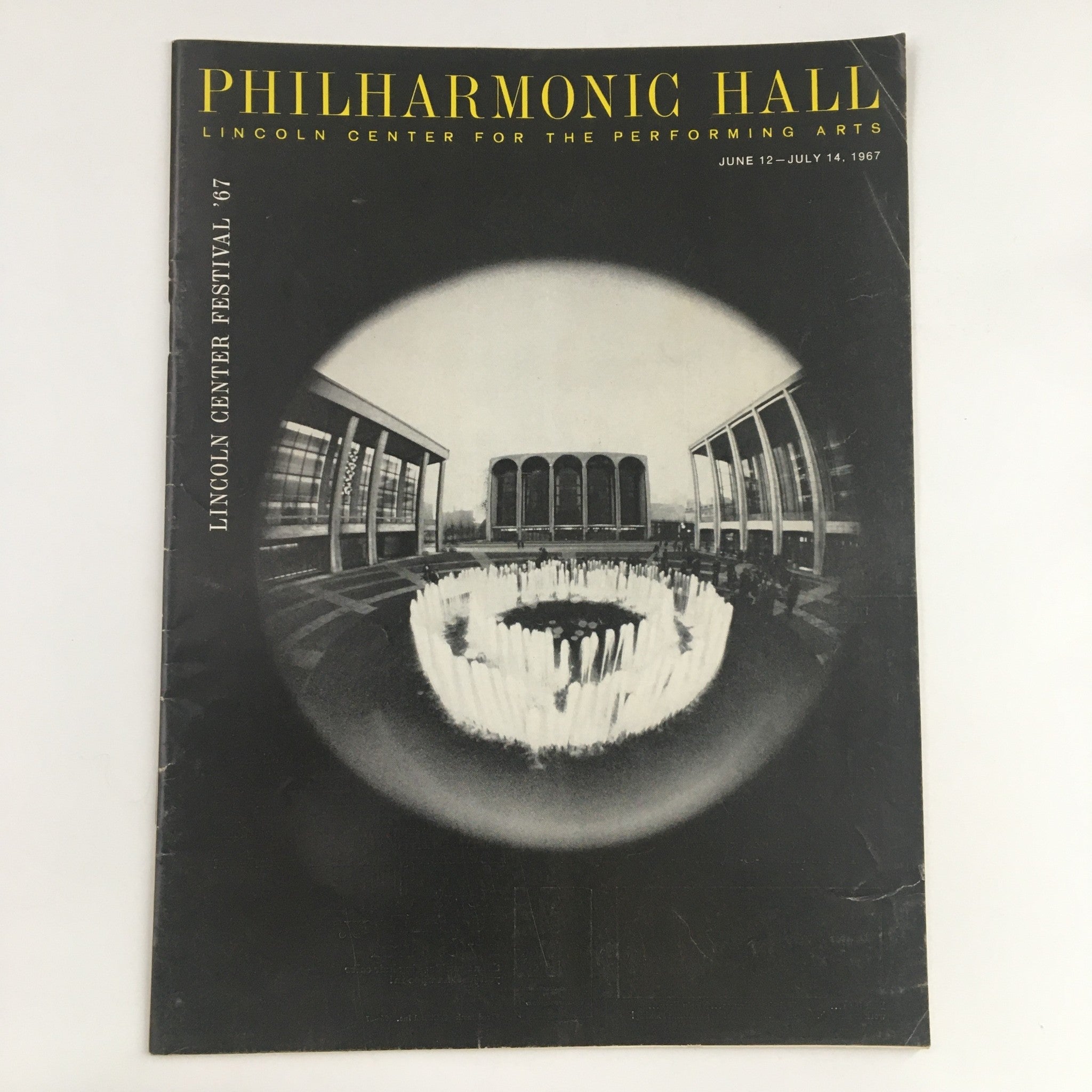 Cover of the 1967 magazine featuring the title 'PHILHARMONIC HALL LINCOLN CENTER FOR THE PERFORMING ARTS' and details for Lincoln Center Festival with a photograph of the hall.