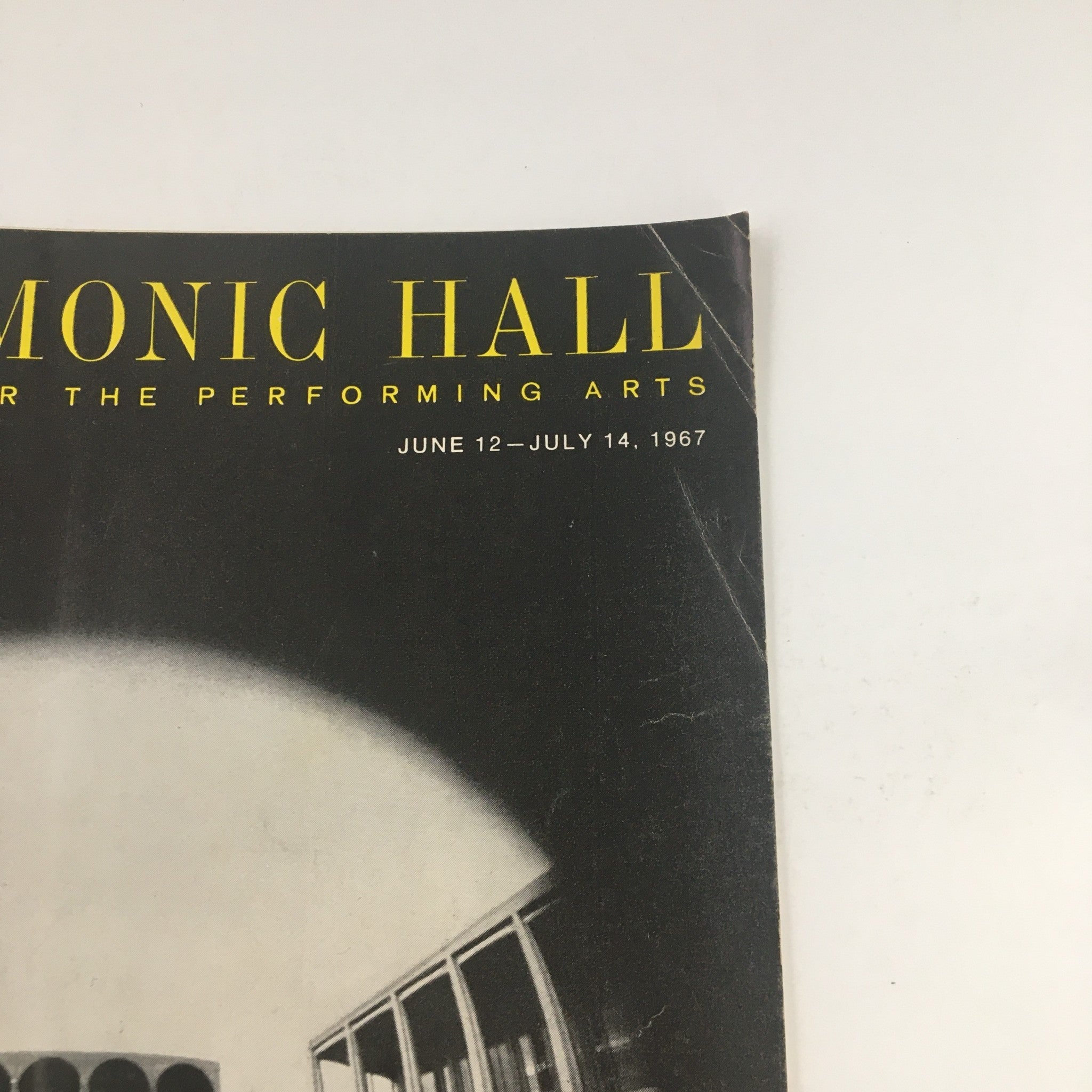 Close-up of the 1967 magazine cover for 'PHILHARMONIC HALL LINCOLN CENTER FOR THE PERFORMING ARTS', showing details of the June 12 to July 14 concert dates.