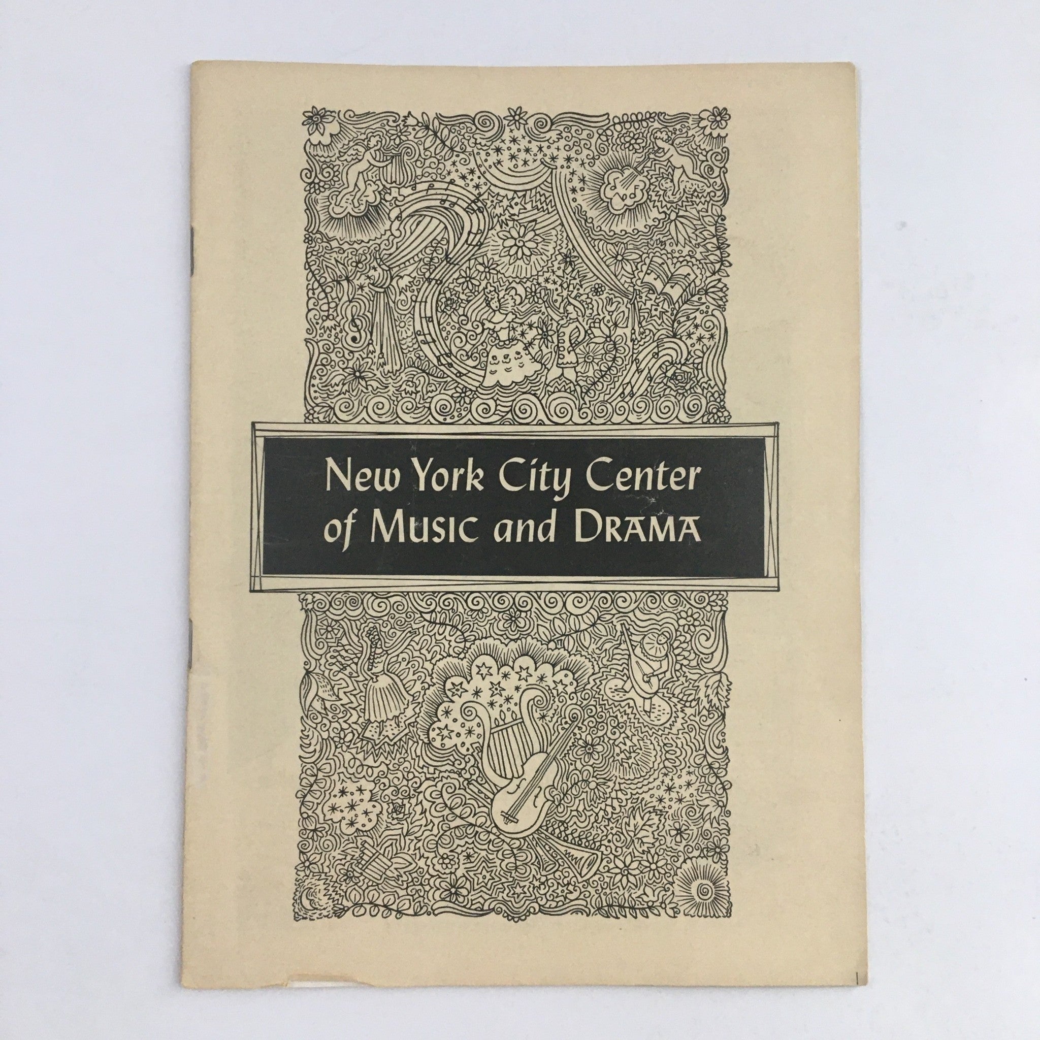 Cover of the 1949 New York City Center of Music and Drama Present Fall Season program featuring intricate illustrations and the title prominently displayed.