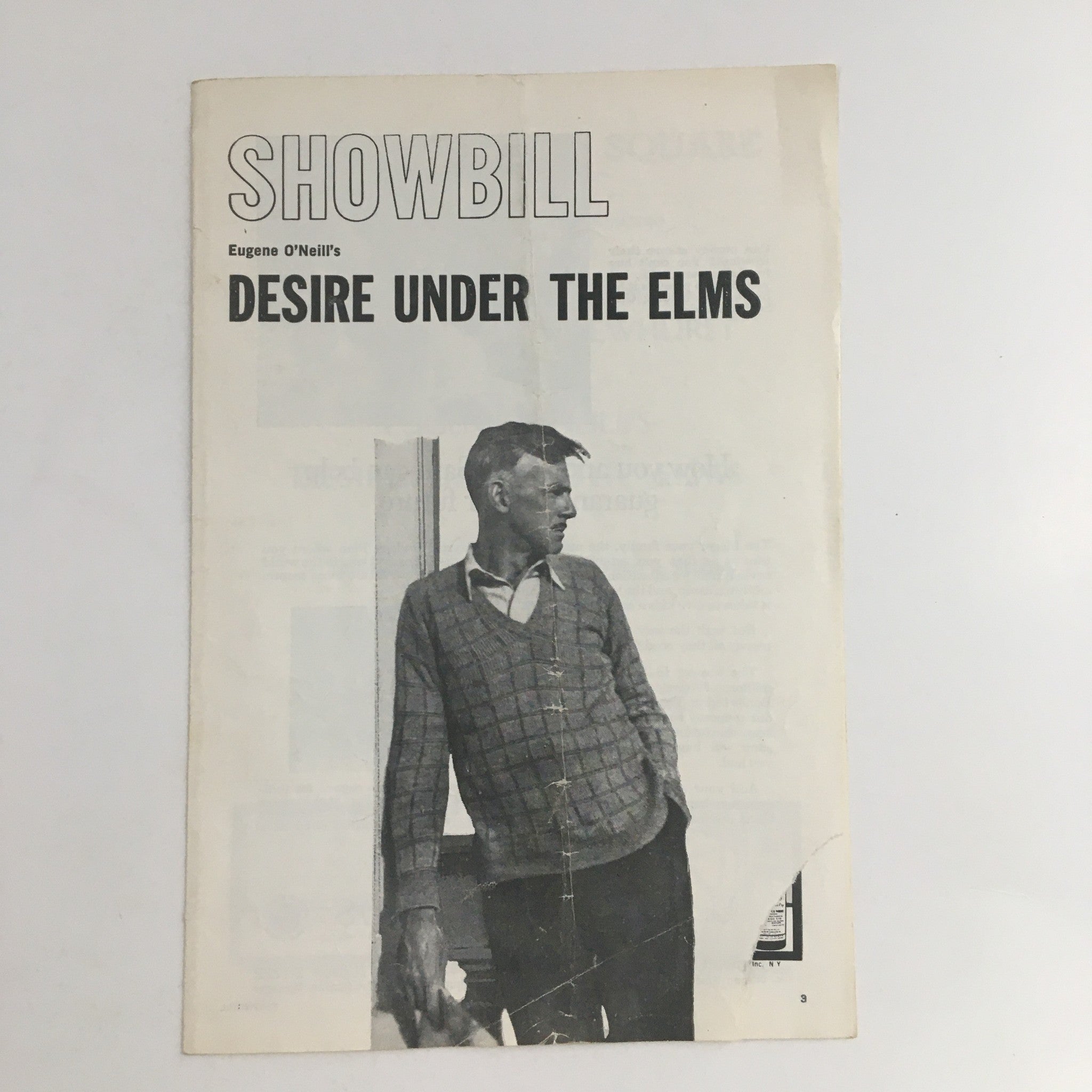 1958 Showbill for Eugene O'Neill's Desire Under The Elms, featuring a male figure leaning against a wall. The showbill is in acceptable condition with visible rips and marks.