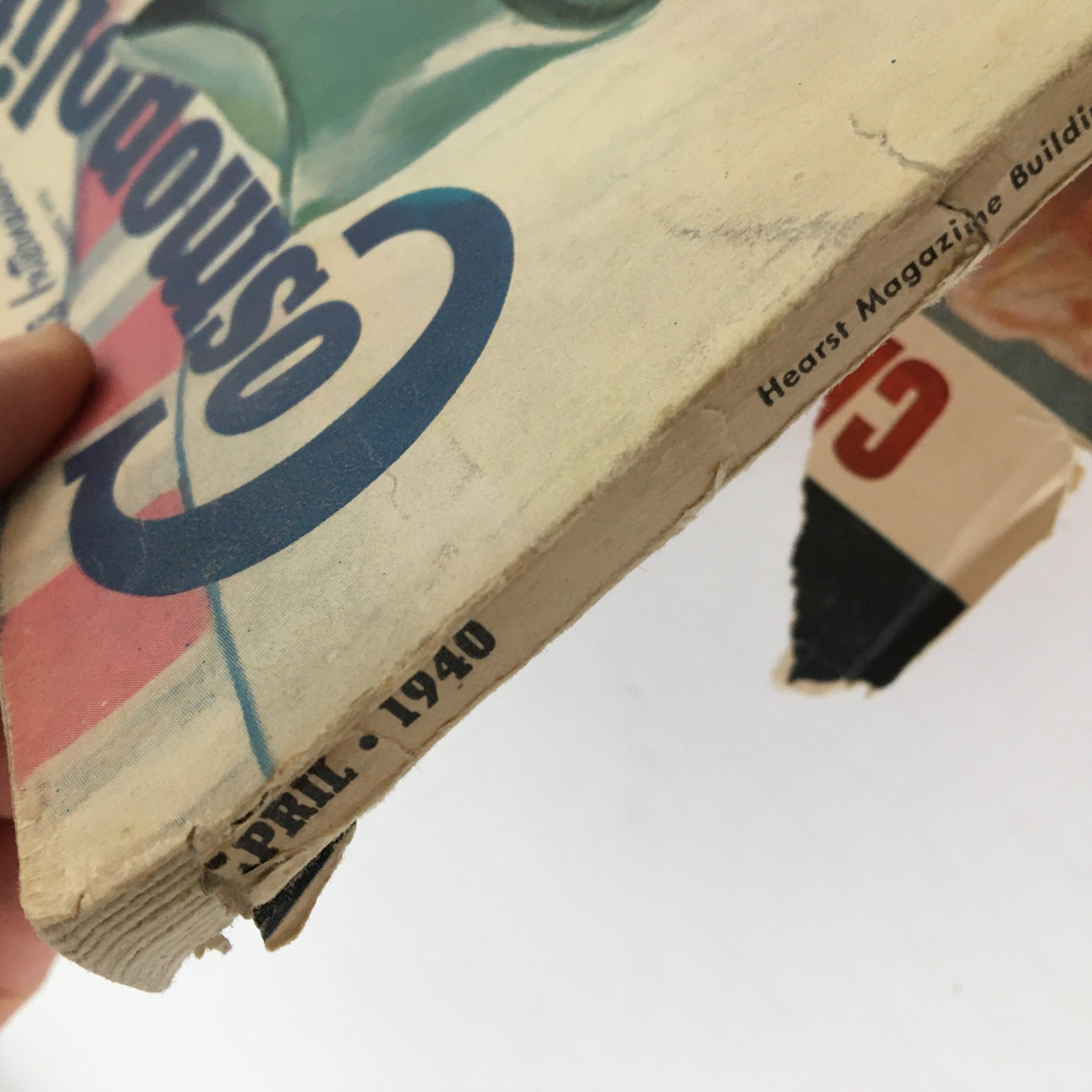 Spine view of VTG Cosmopolitan Magazine April 1940, highlighting publication date and style, part of the vintage collection with 'Lily Comes Home At Last' by Mary Rinehart.