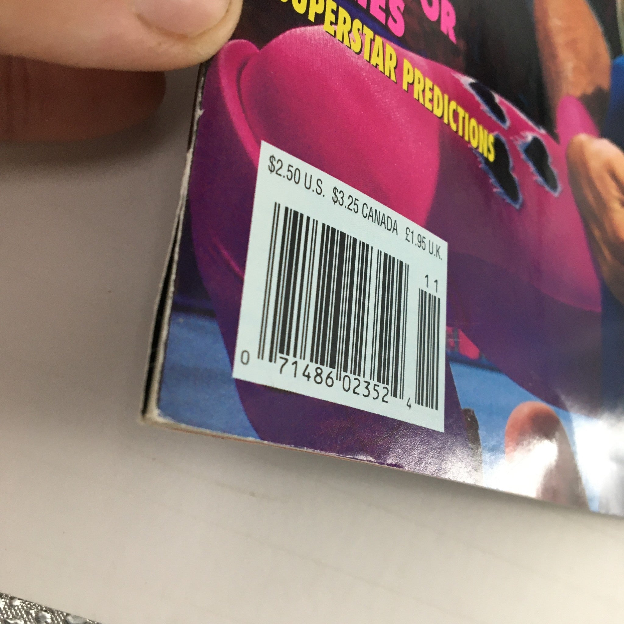 Close-up of the barcode and pricing details on the back cover of WWF Magazine November 1992, highlighting the collectible nature of this vintage wrestling magazine.