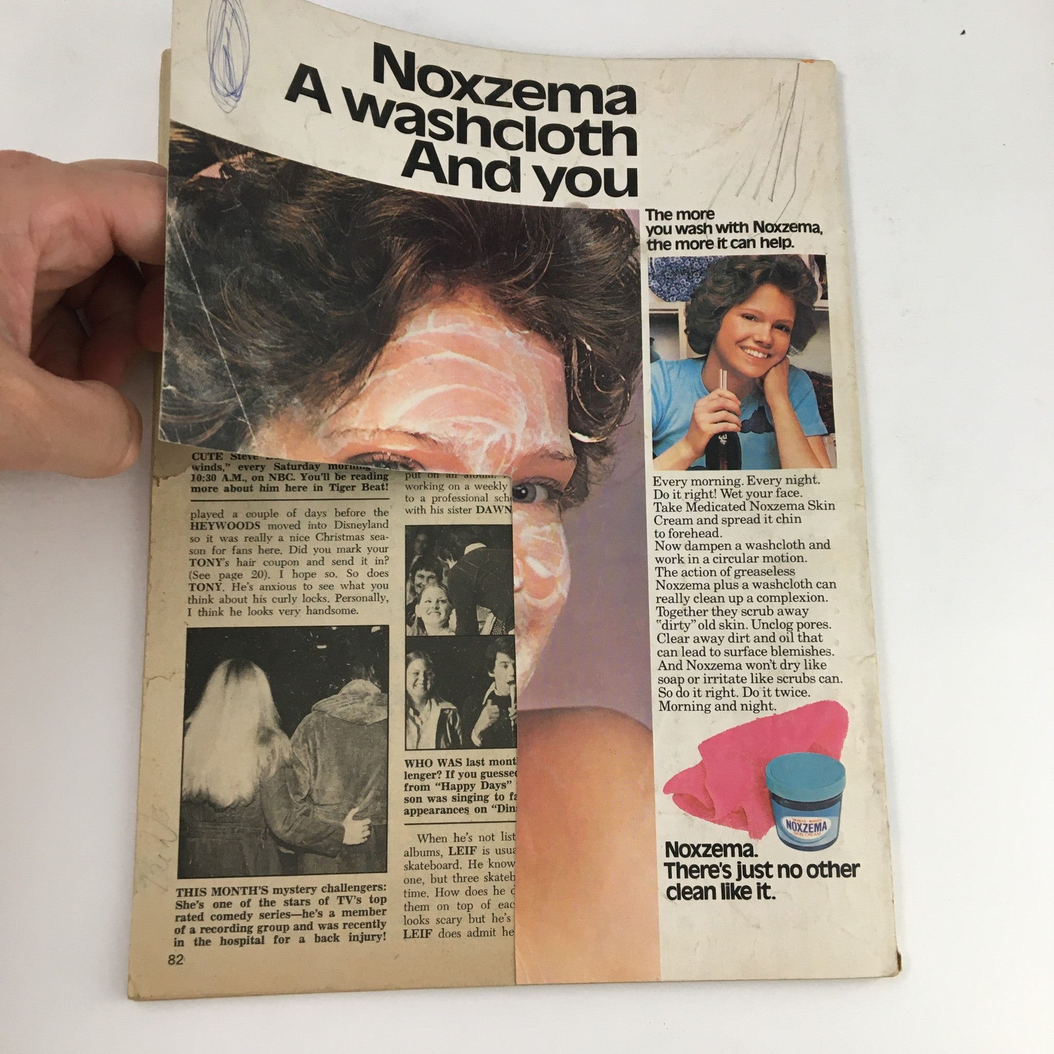 Vintage advertisement from Tiger Beat Magazine February 1976 featuring Noxzema skin care product with a model demonstrating its use.