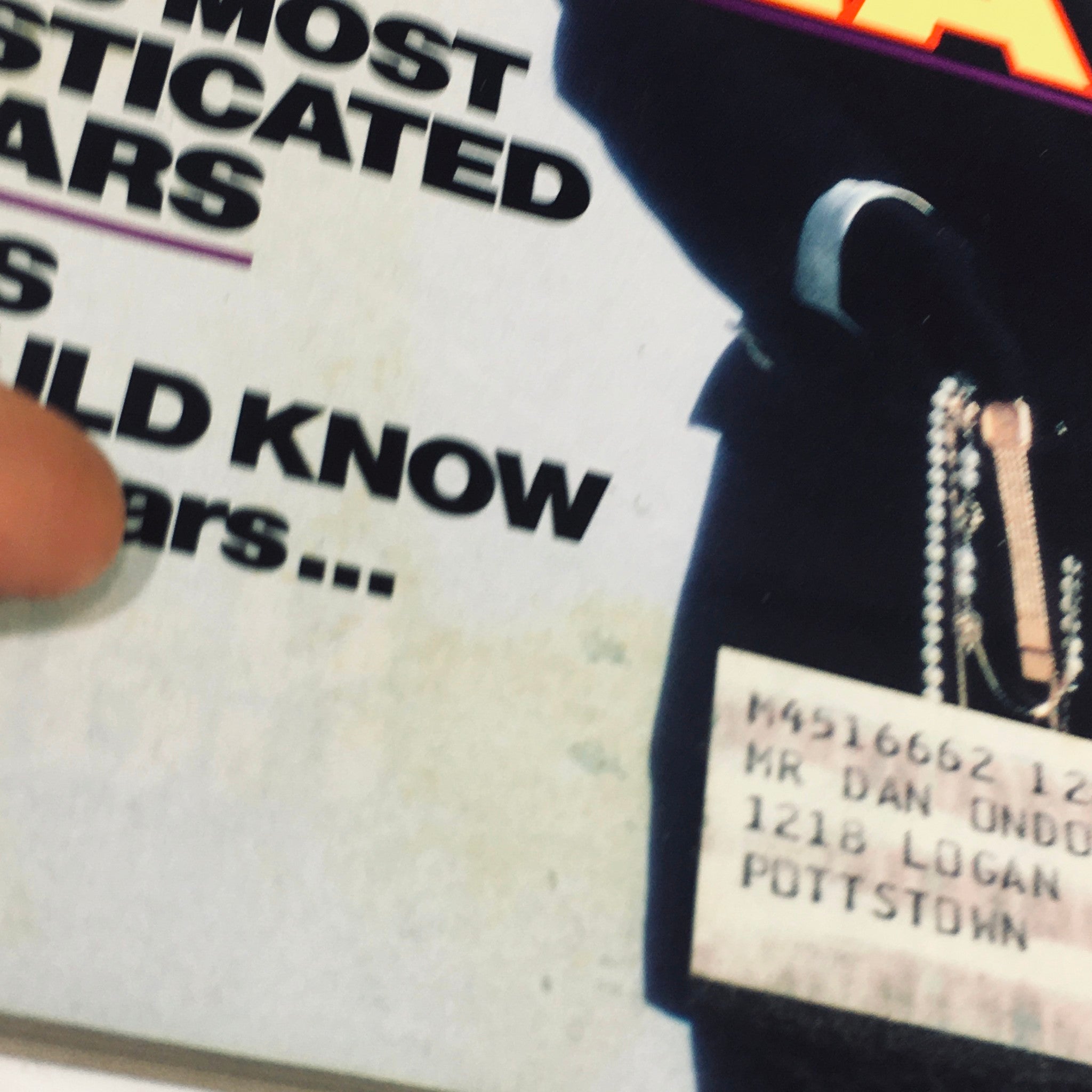 Detailed view of the lower section of the cover of VTG Philadelphia Magazine May 1981, highlighting text about Philly's Most Sophisticated Burglars with a visible address label, adding vintage charm.