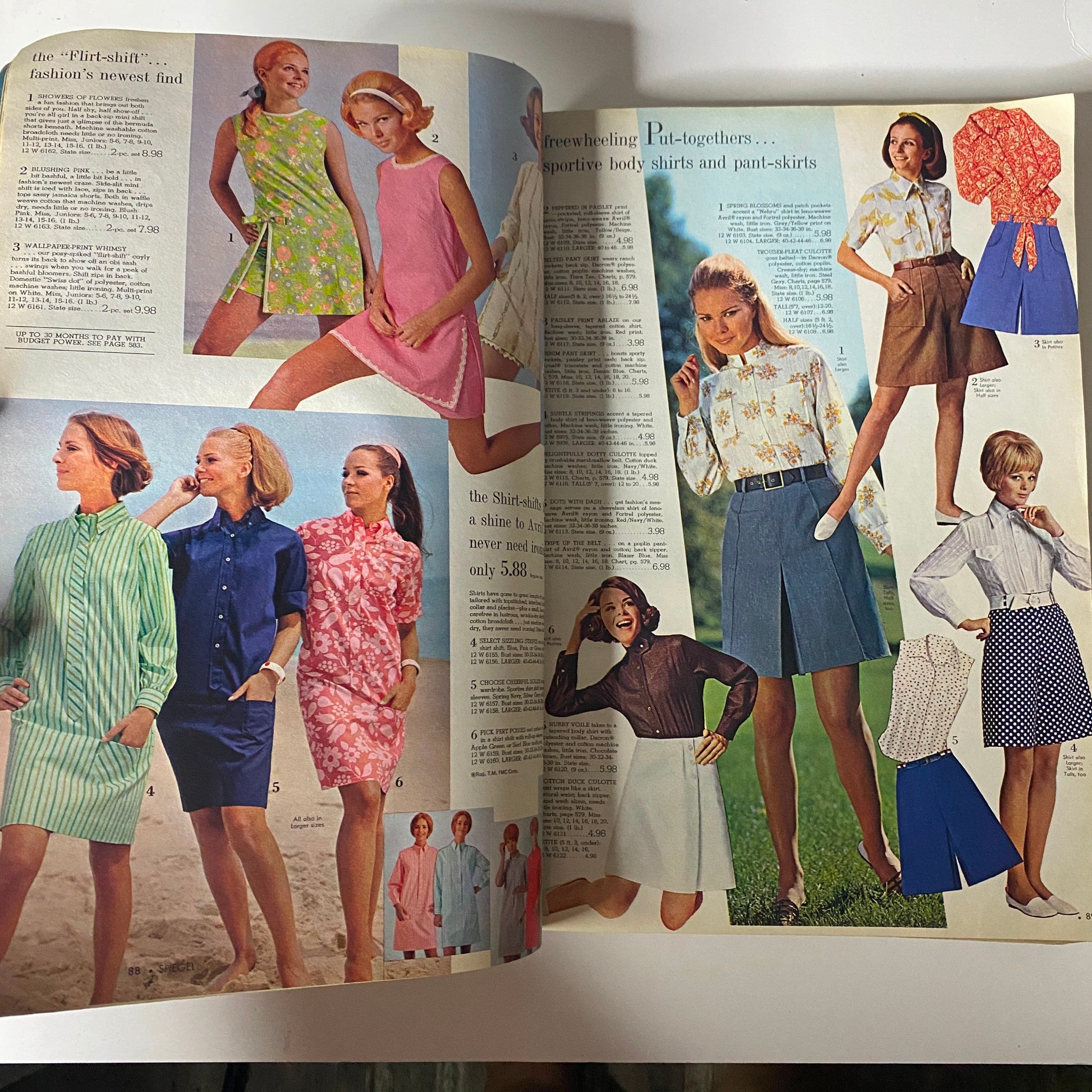 Inside pages of the 1969 Spiegel Spring and Summer Catalog illustrating fresh summer styles, including body shirts and stylish skirts on models in various poses.