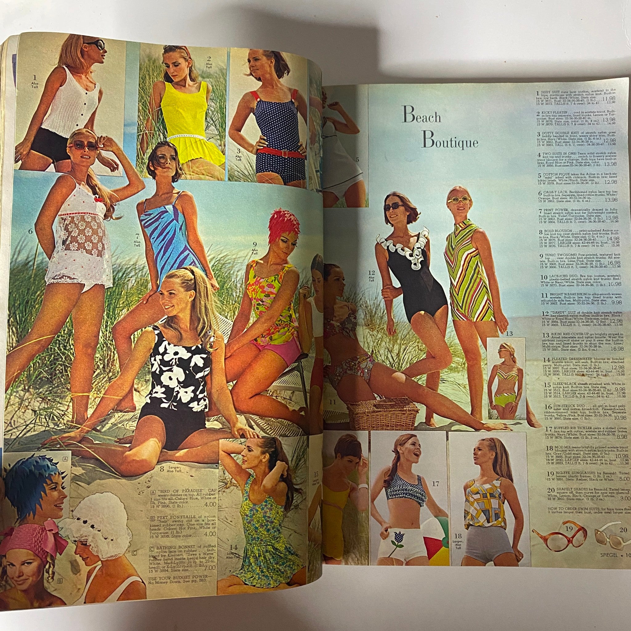 1969 Spiegel Spring and Summer Catalog featuring a vibrant 'Beach Boutique' section showcasing women in various stylish swimsuits and beach attire, highlighting colorful patterns and summer fashion trends from the era.