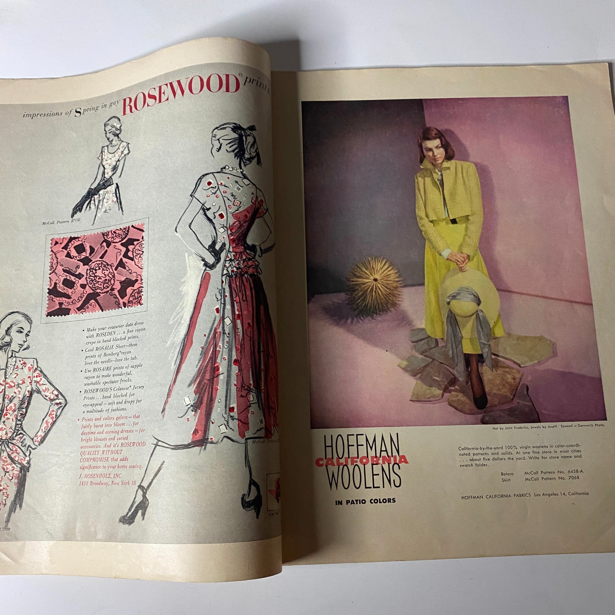 Interior page of the 1948 McCall Styles Spring Pattern Book Catalog featuring fashion illustrations with designs like a long dress and modern silhouettes, emphasizing mid-century fashion aesthetics.