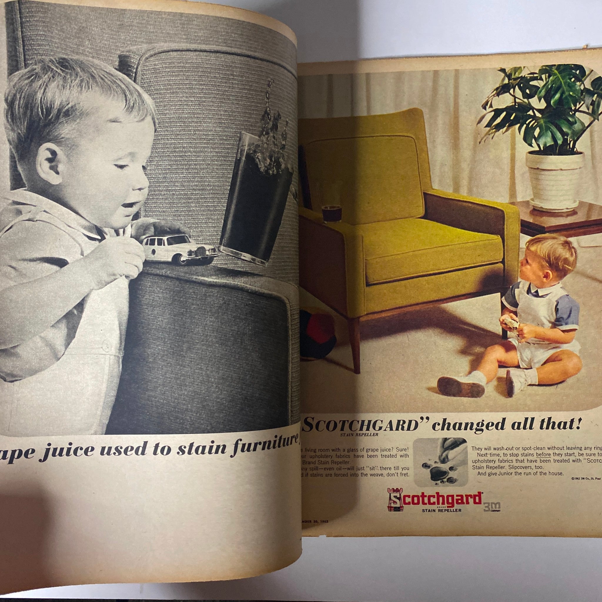 A vintage advertisement from The New York Times Magazine September 30, 1962, featuring a young boy playing with a toy car next to a sofa. The ad promotes Scotchgard, a fabric protector for furniture.