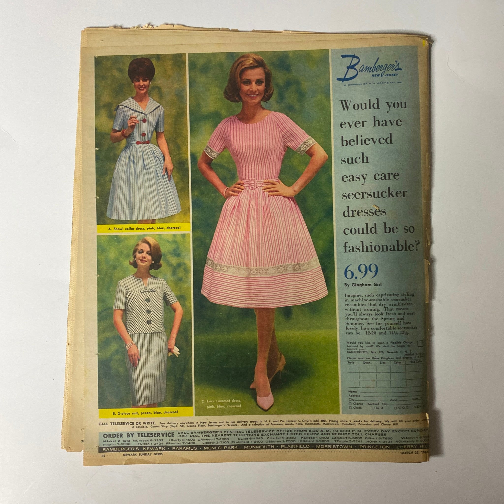 Fashion advertisement for easy care seersucker dresses from Bambergers, illustrated in the Sunday Newark News Magazine March 22, 1964 World's Fair Preview, highlighting women's fashion trends of Spring 1964.