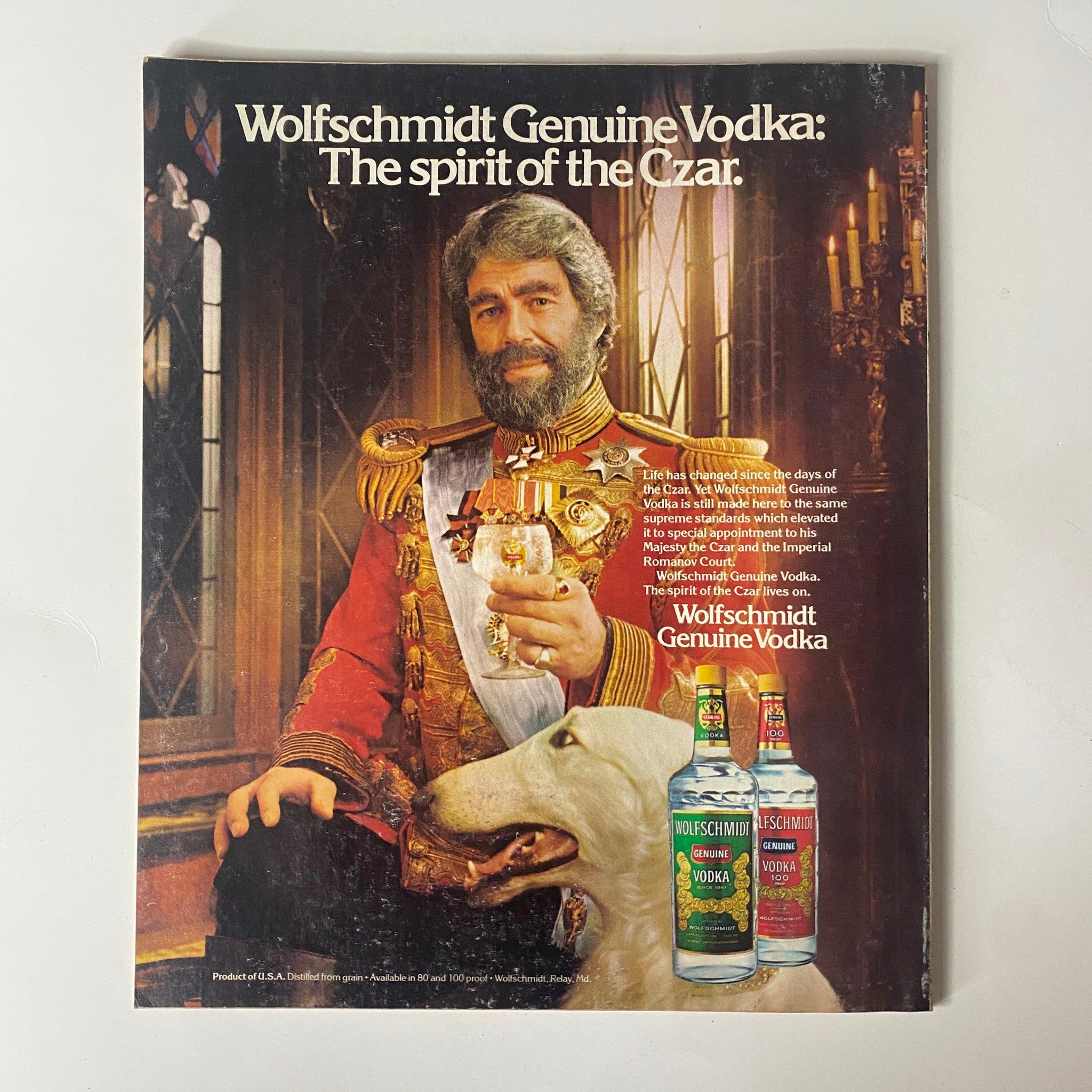 Cover of Fortune Magazine dated July 28, 1980 featuring Walter Spitzmiller's cover painting, showcasing a historical figure with a white dog and a bottle of Wolfschmidt Genuine Vodka, underlined by the tagline 'The spirit of the Czar'. This image captures the essence of 1980s branding and the artistic style of that era.