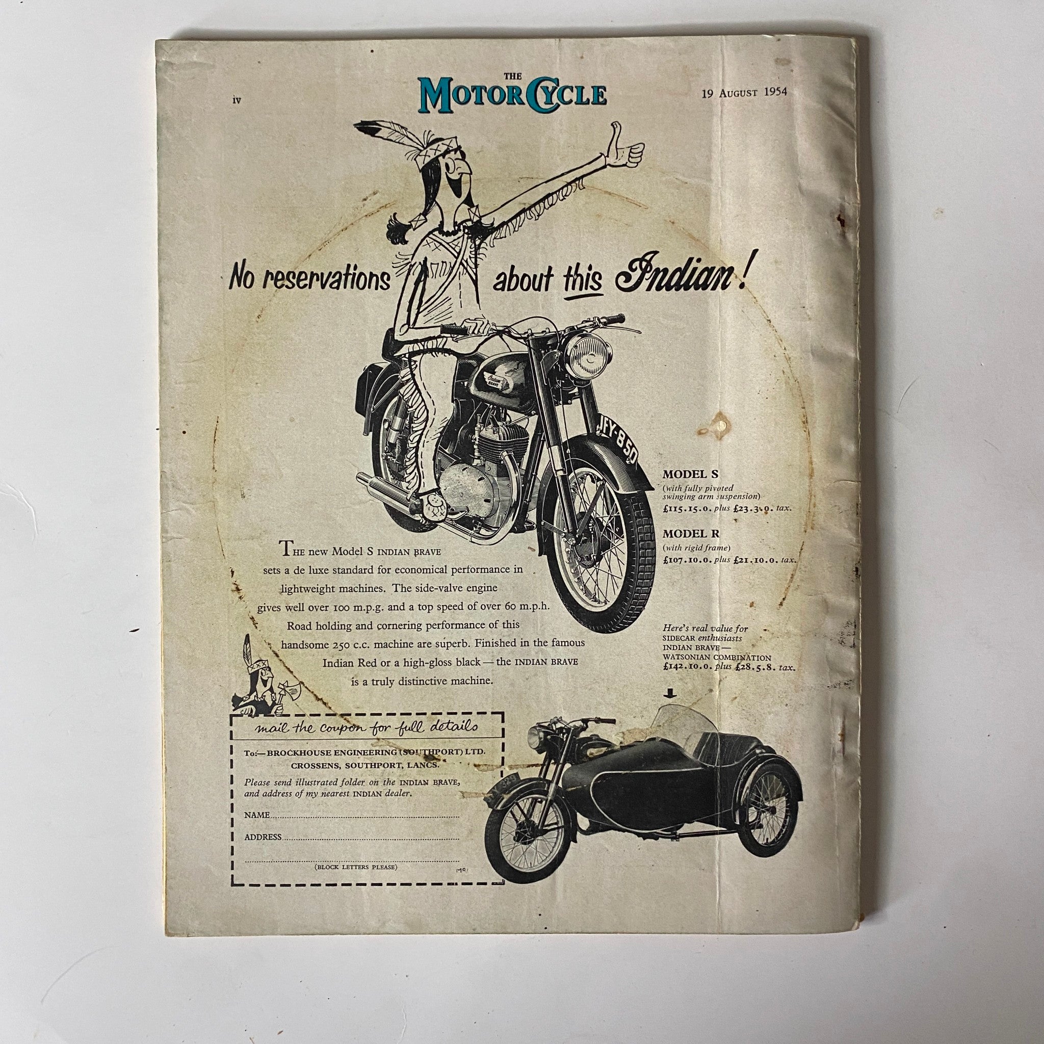 Cover page of The Motor Cycle Magazine August 19, 1954, featuring an Indian motorcycle advertisement with a humorous illustration of a motorcycle enthusiast.