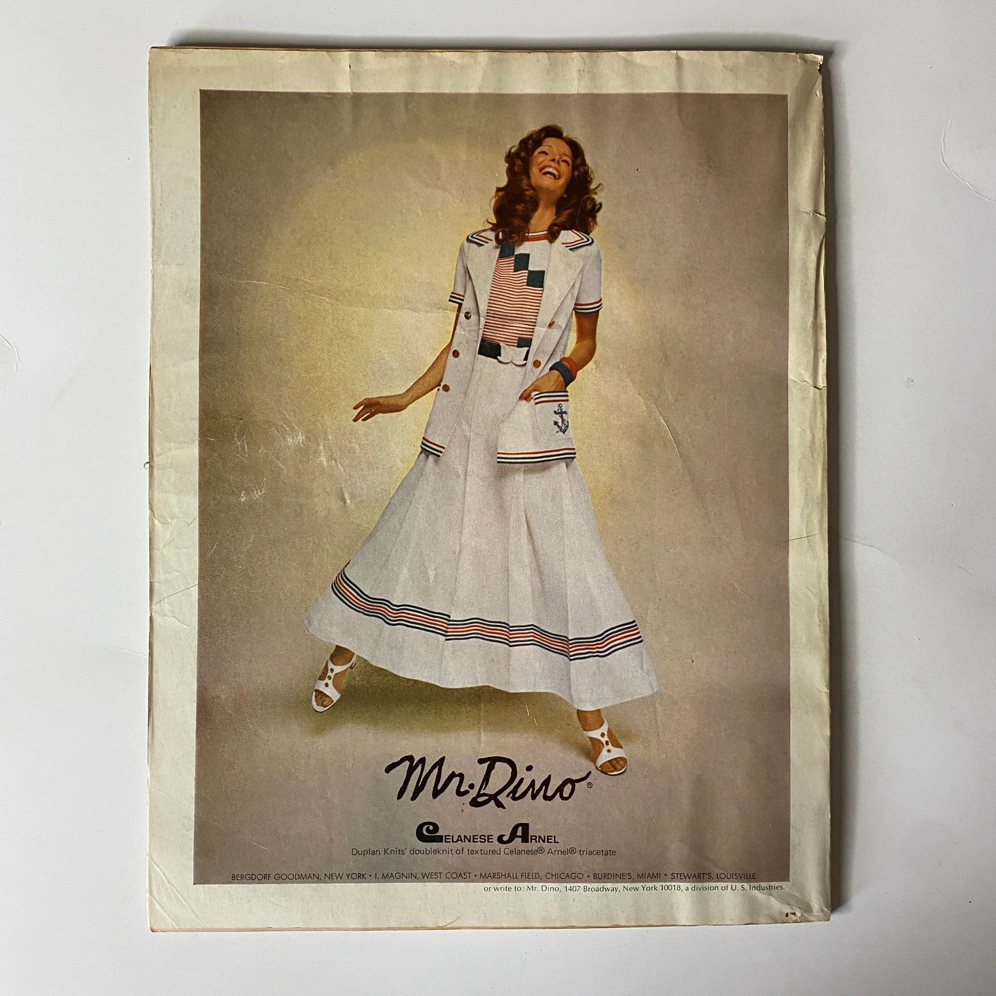 Vintage Mr. Rino fashion advertisement from Vogue Magazine January 15, 1972 showcasing a model in a chic nautical-inspired outfit, perfect for summer styling.