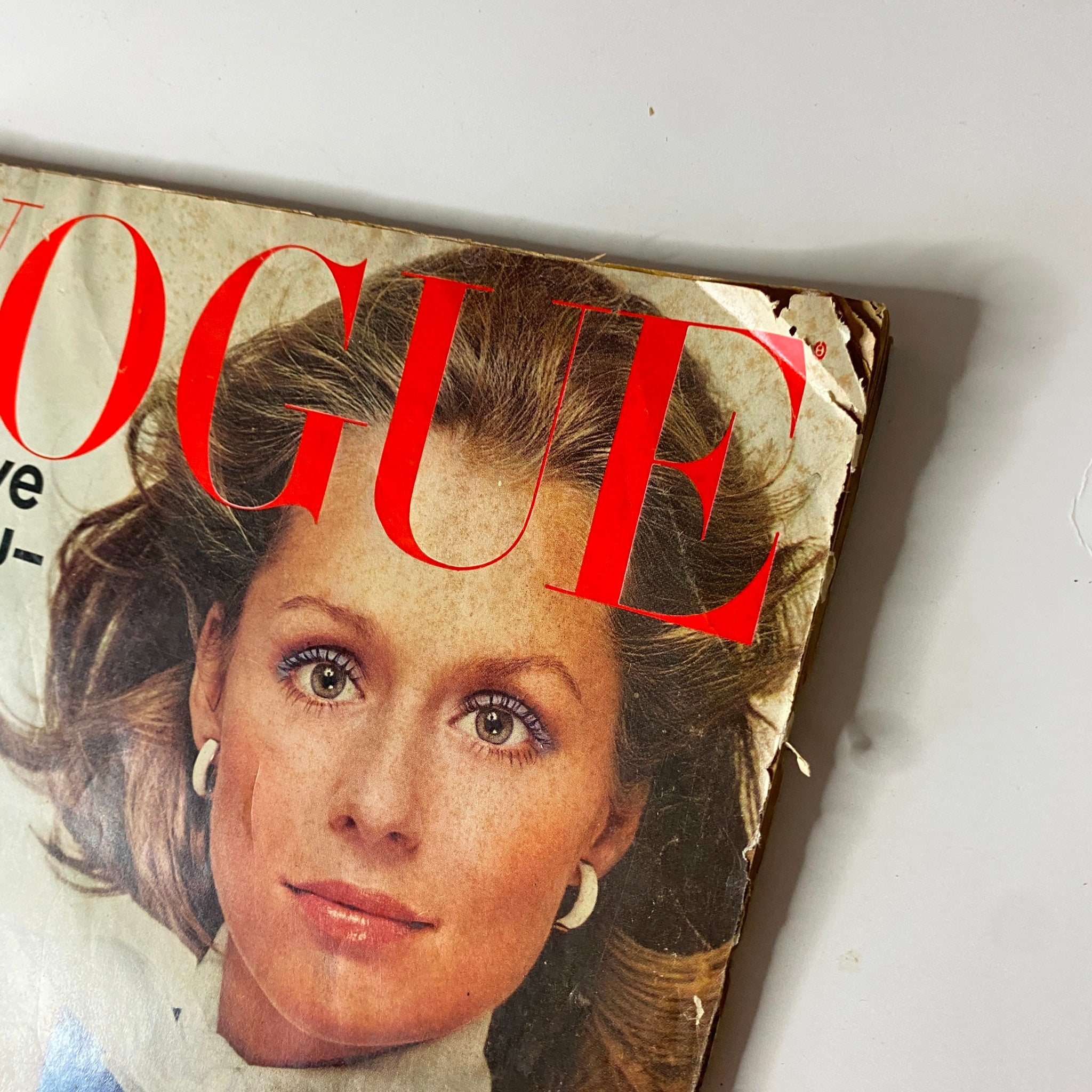 Close-up of the Vogue Magazine January 1, 1972 cover, highlighting Lauren Hutton's striking features and fashion presentation.