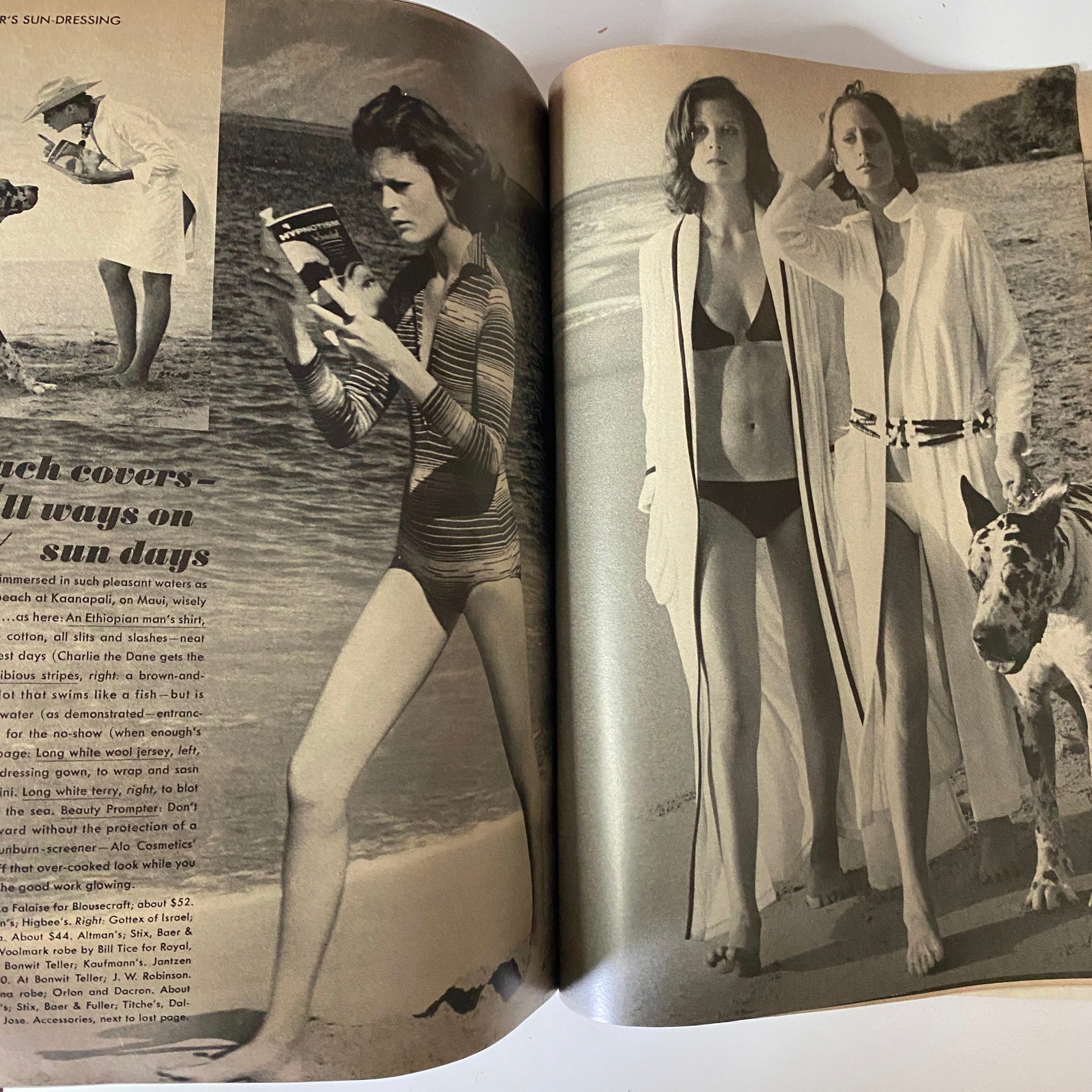 Vogue Magazine January 1, 1972 Lauren Hutton Cover GD Interior showcasing models in stylish beachwear; one model poses playfully with a camera while another poses on the beach with a dog.