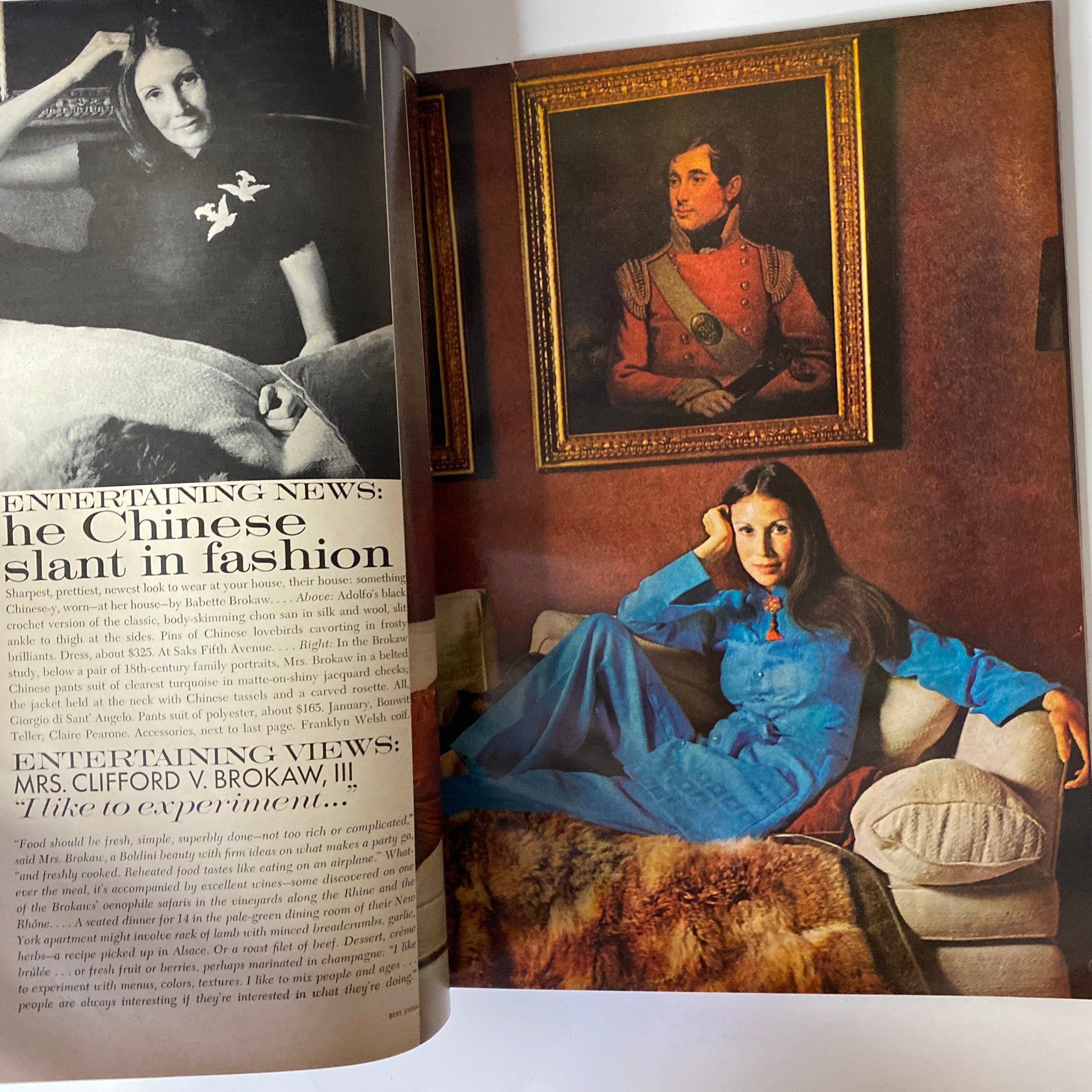 Vogue Magazine November 15, 1971: An engaging fashion photograph featuring a woman seated in a fashionable outfit with a background of classic portraits, illustrating the harmony of contemporary style and historical art.