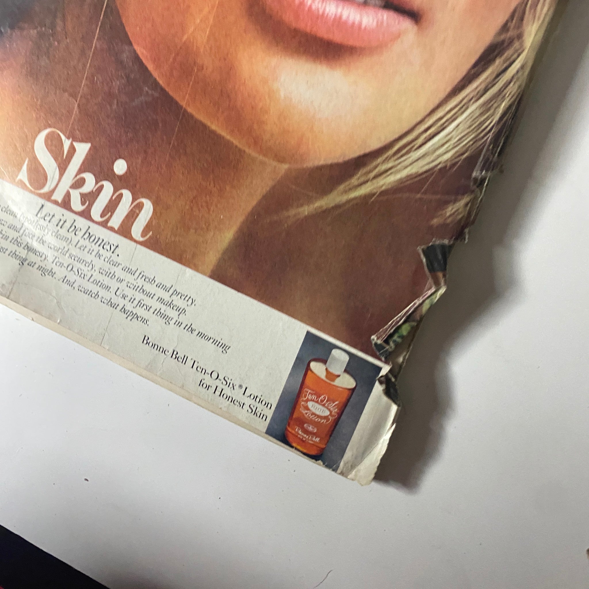Close-up of a beauty advertisement showcasing skin care products. The image captures a model's face with captivating blue eyes, promoting freshness and honesty in skin care from Vogue Magazine - November 1, 1971.