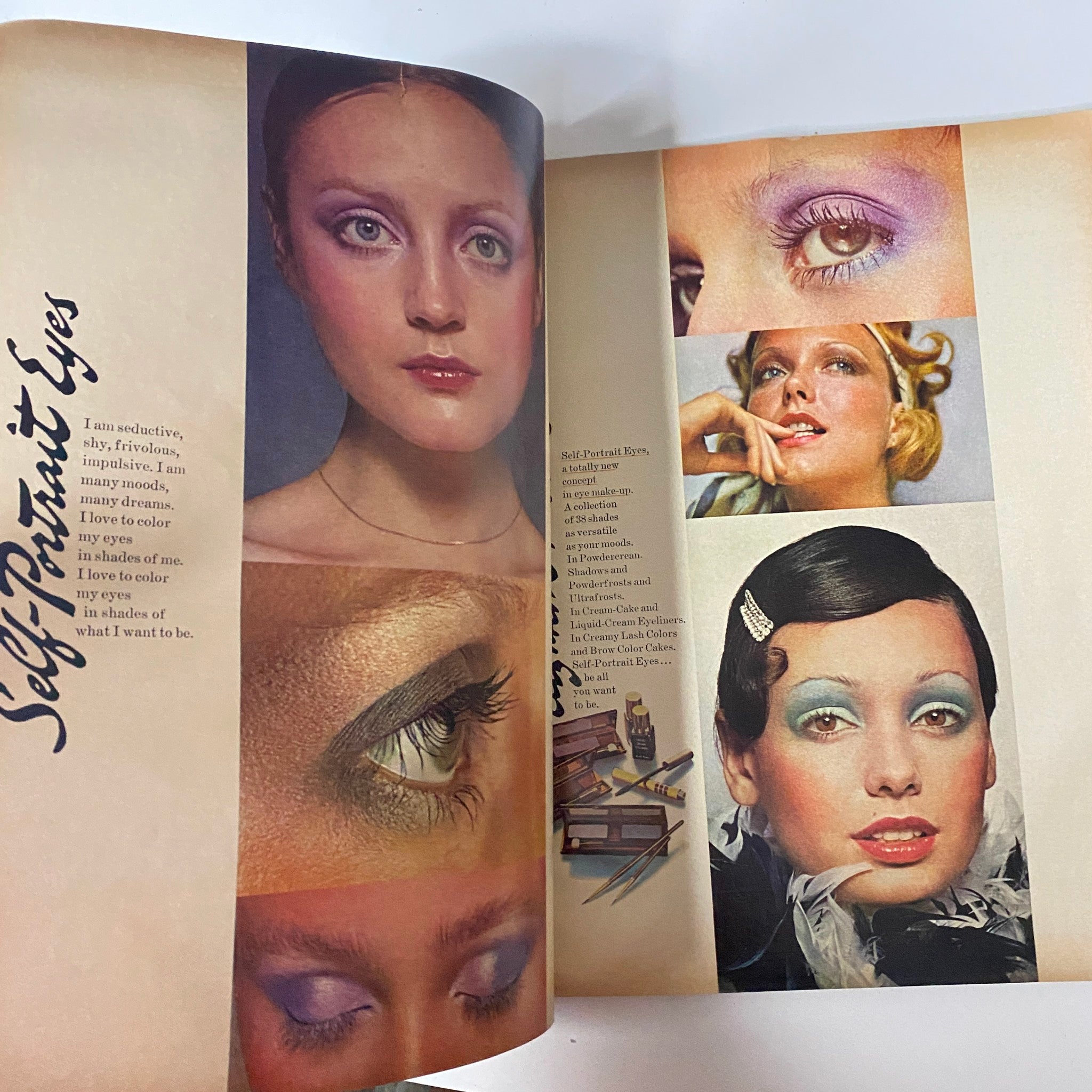 Vogue Magazine October 1, 1971 Donna Mitchell Cover showcasing various eye makeup styles on models, emphasizing self-portrait techniques and colorful eyeshadow. The image celebrates makeup artistry in the 1970s.