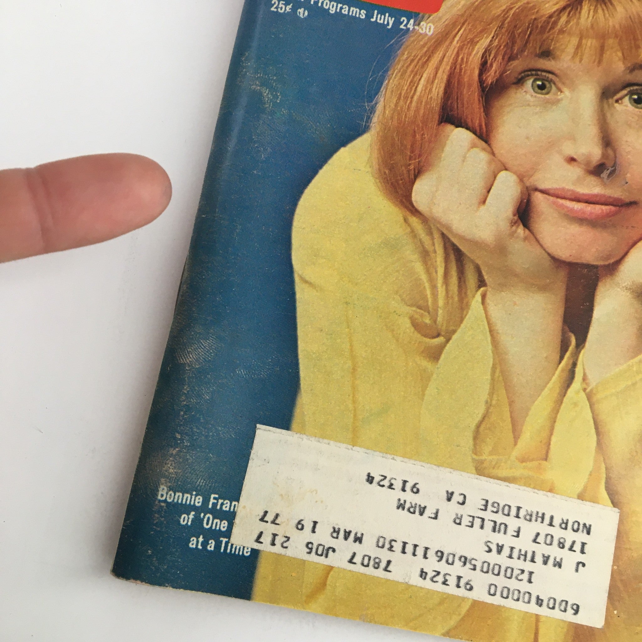 Close-up of the TV Guide Magazine July 24 1976 featuring Bonnie Franklin, highlighting details like the worn cover and address label, capturing the nostalgic essence of 1970s television.