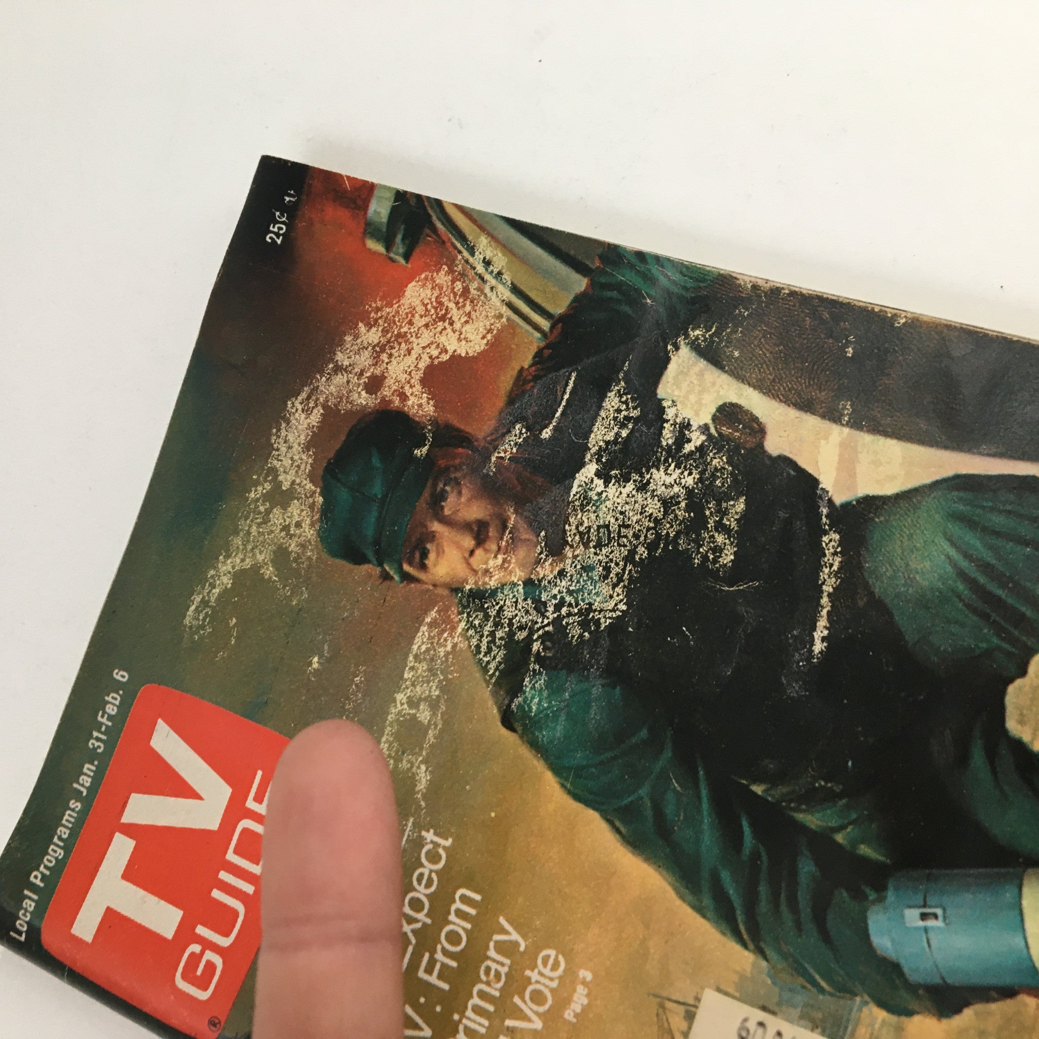 Close-up view of the cover of TV Guide Magazine January 31 1976 highlighting Steve Forrest from SWAT, with visible wear and an attached address label.