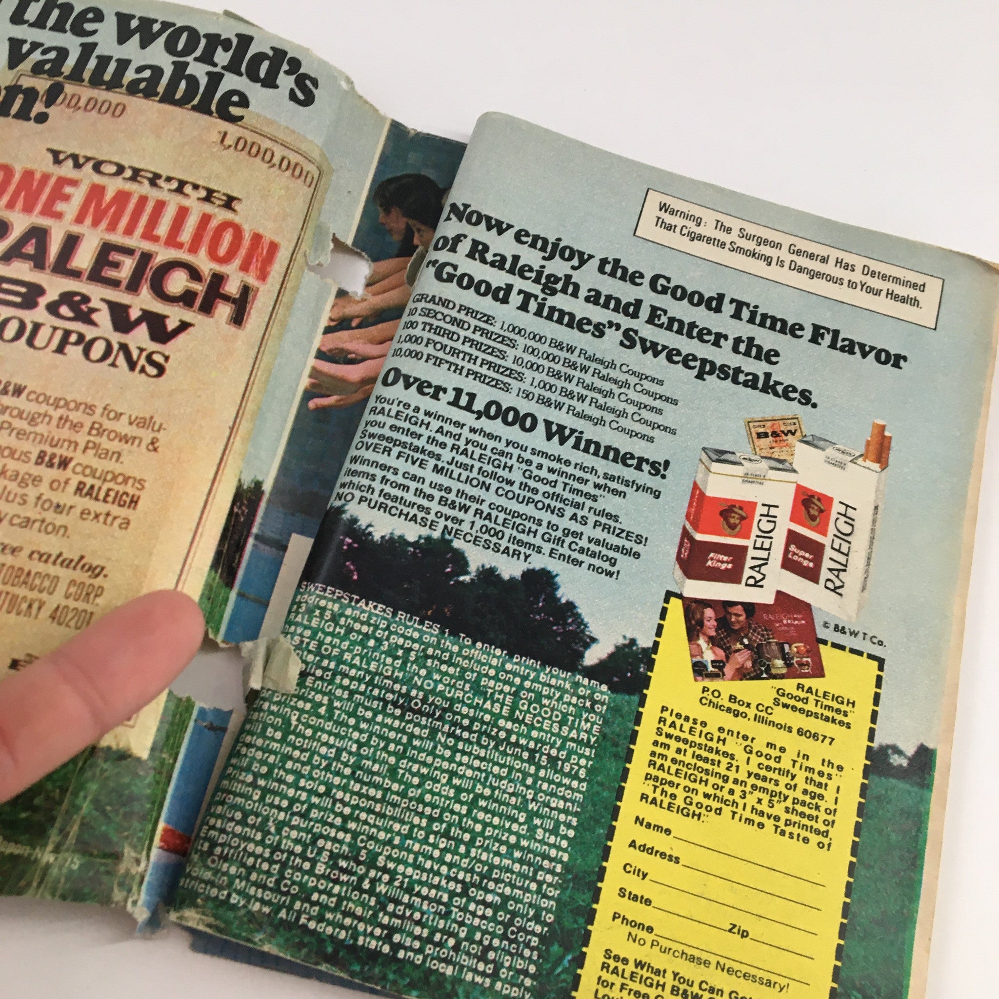 Inside page of TV Guide Magazine March 13 1976, promoting a Raleigh cigarette sweepstakes, capturing the advertising style of the 1970s.