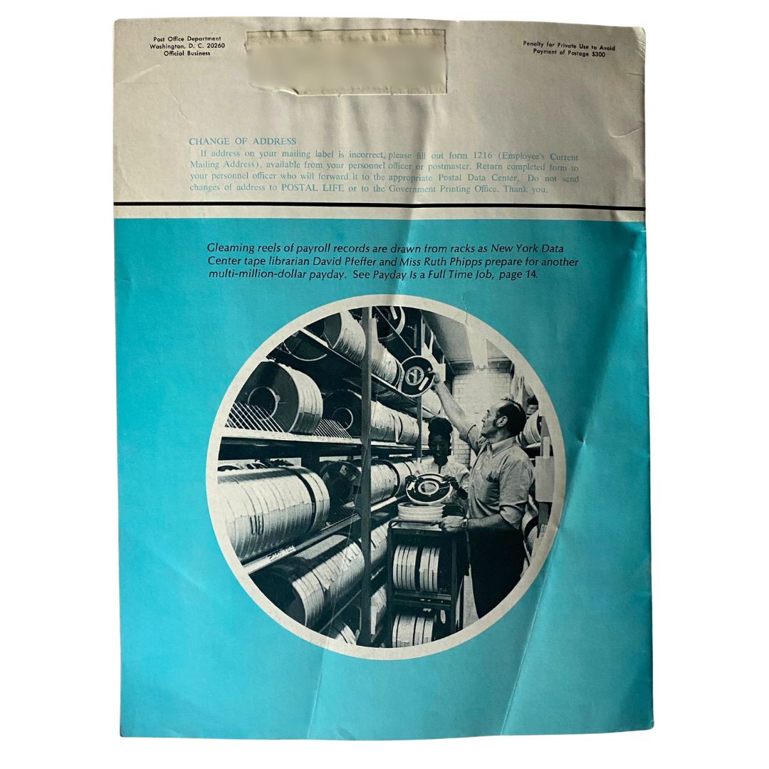 Back cover of VTG Postal Life Magazine January - February 1970 featuring a change of address notice and a vintage photo of postal employees managing records.