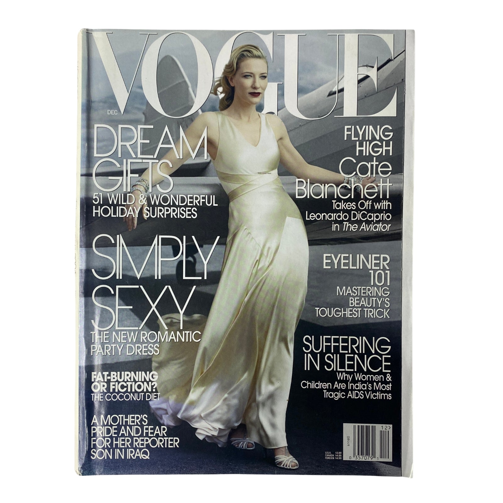 Vogue Magazine December 2004 featuring Cate Blanchett on the cover, showcasing fashion themes and holiday surprises.