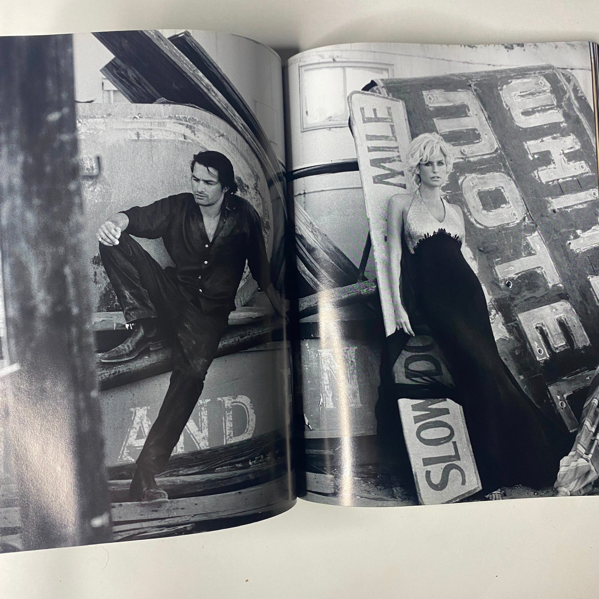 Interior spread from Vogue Magazine December 2004 showing a fashion shoot with models in striking black and white, emphasizing timeless style.