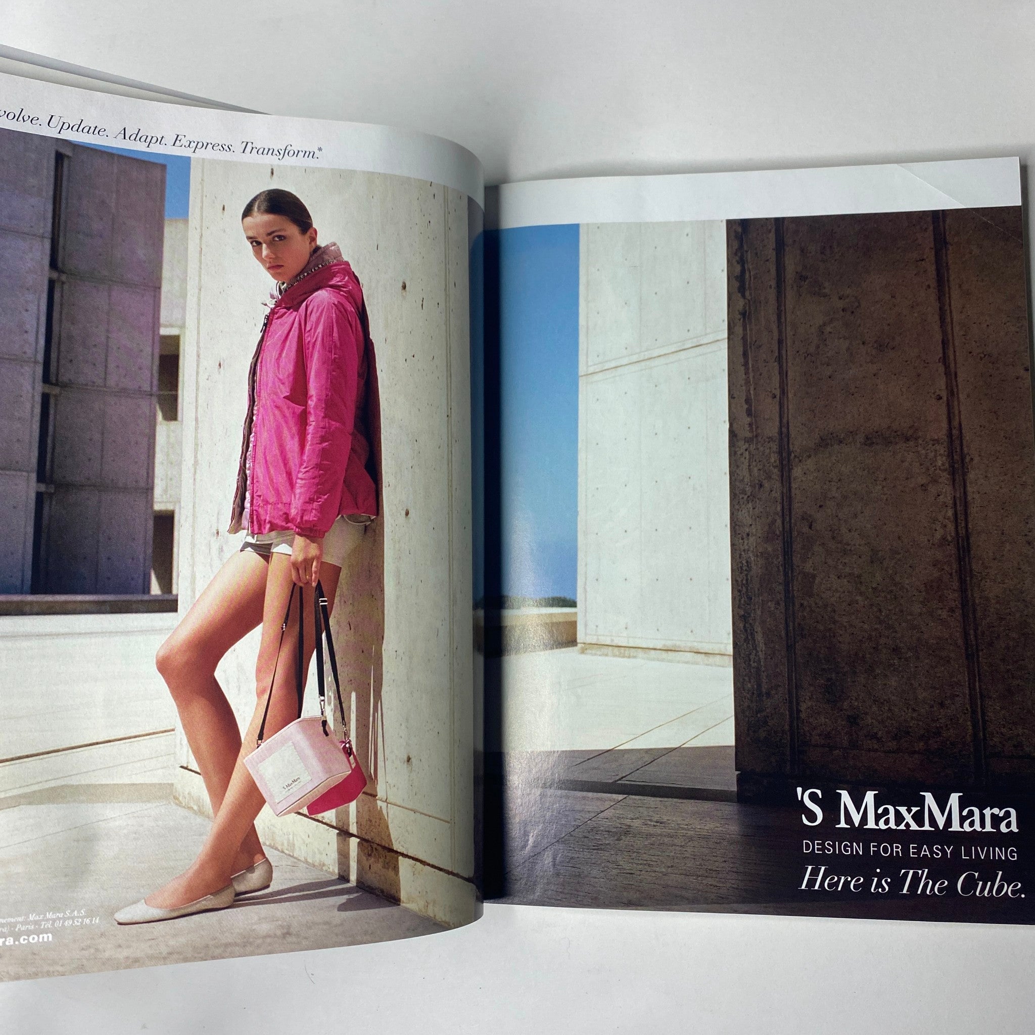 Vogue Paris Magazine February 2013 No. 934 includes a fashion spread featuring 'S MaxMara, highlighting a stylish model in a pink jacket paired with shorts, set against a modern architectural backdrop.