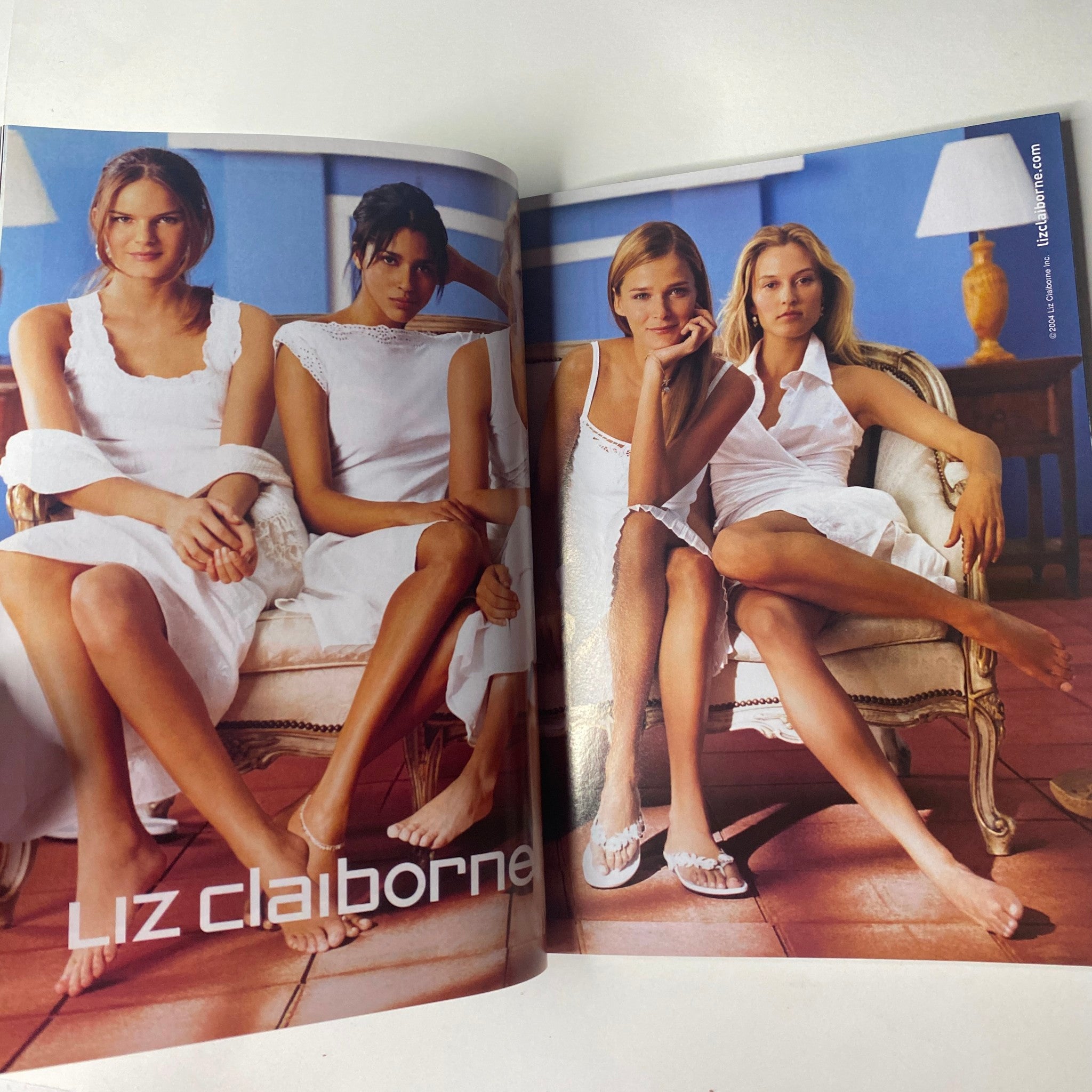 Fashion spread in Vogue Magazine May 2004 featuring models in white outfits, promoting Liz Claiborne's spring collection.