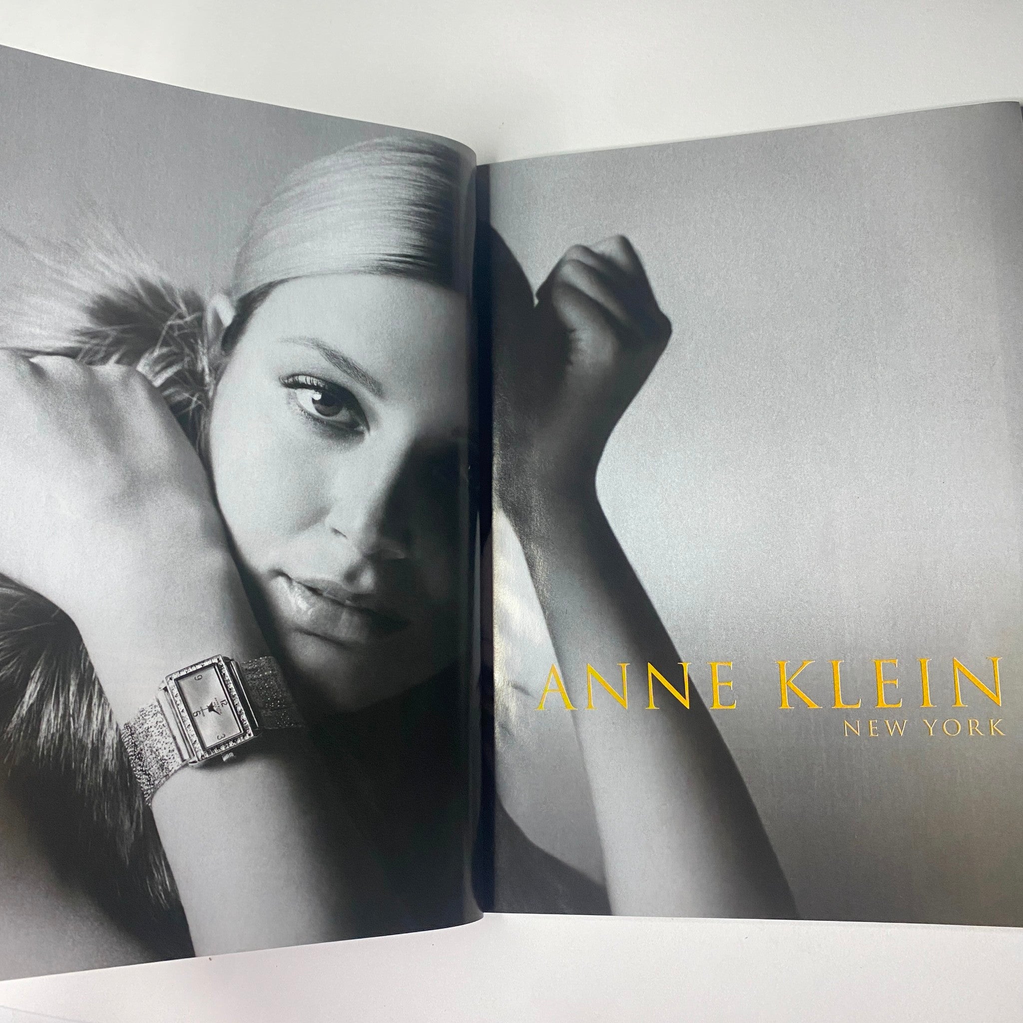 Vogue Magazine January 2005 image of an Anne Klein advertisement featuring a glamorous model showcasing a watch, emphasizing luxury fashion.