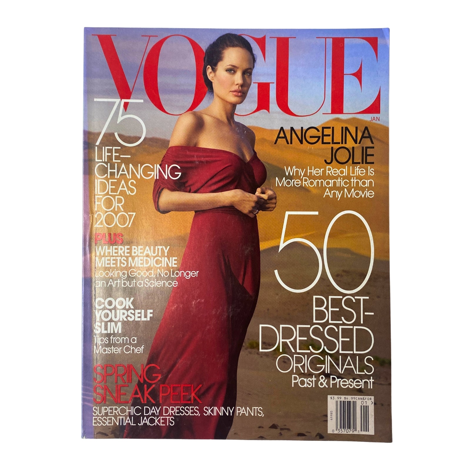 Vogue Magazine January 2007 featuring Angelina Jolie on the cover in a striking red dress. This issue includes content on fashion, beauty trends, and a profile of Jolie discussing her personal life and motherhood.
