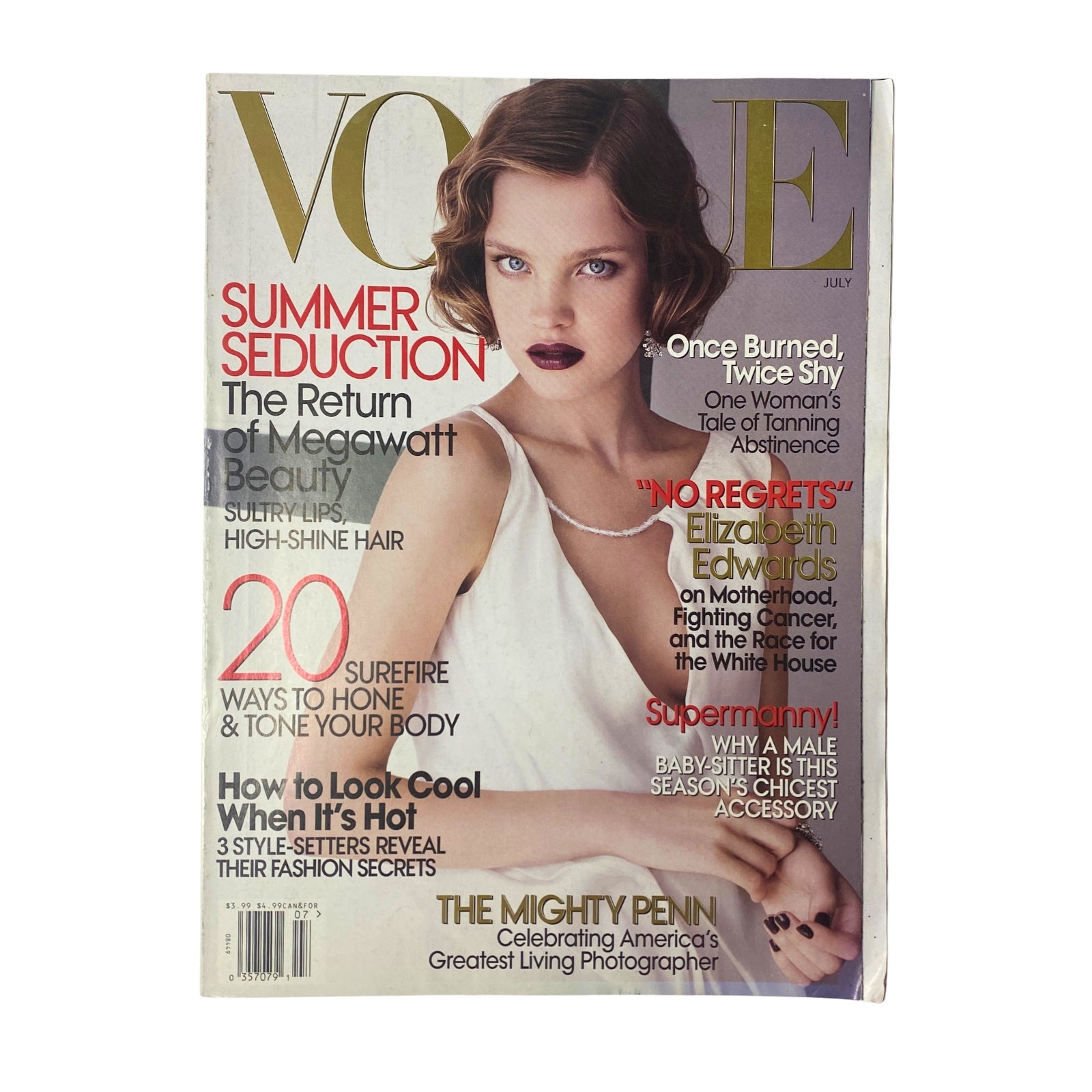 Cover of Vogue Magazine July 2007 featuring Natalia Vodianova, showcasing summer fashion and beauty themes.
