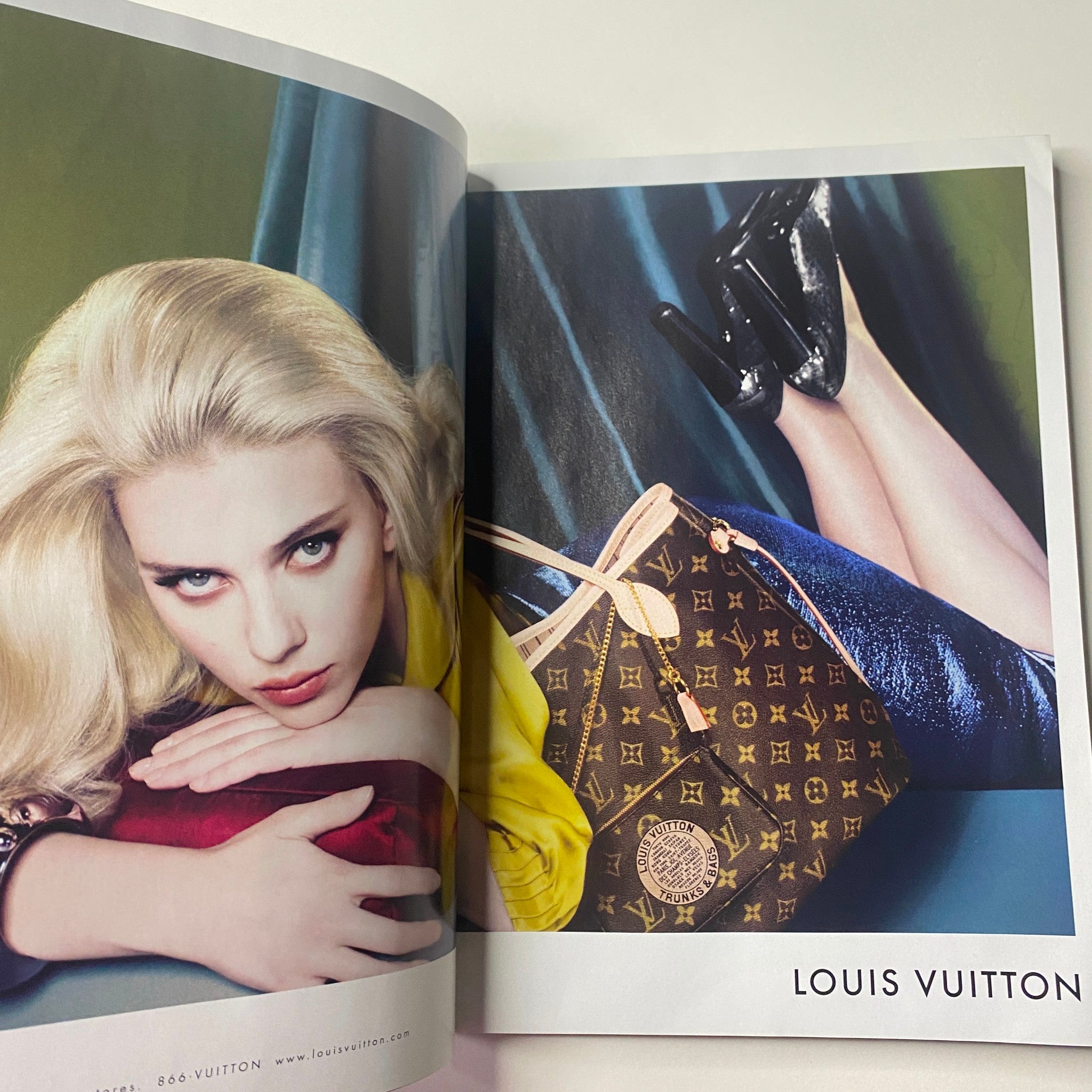 Louis Vuitton advertisement depicting a glamorous model with striking blonde hair and a stylish handbag, featured in Vogue Magazine August 2007 with Winona Ryder on the cover.