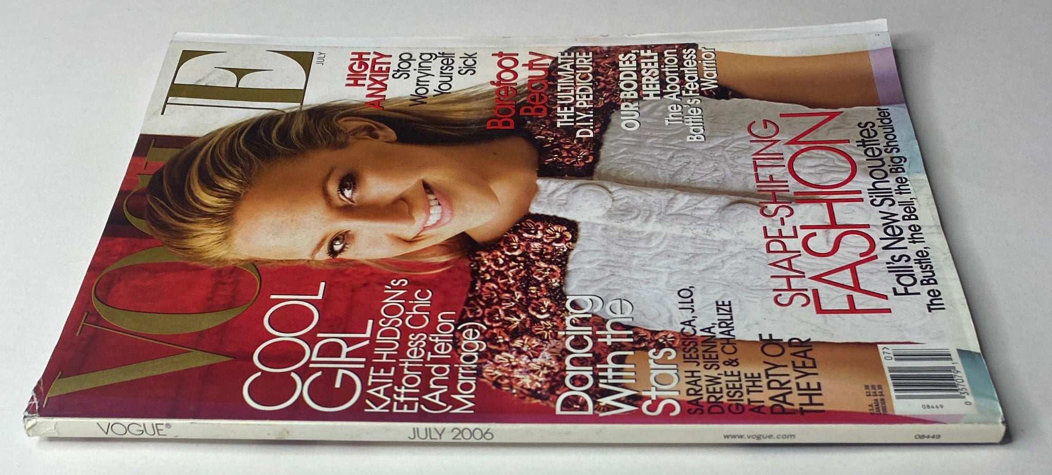Cover of Vogue Magazine July 2006 featuring Kate Hudson, highlighting summer fashion and modern femininity.